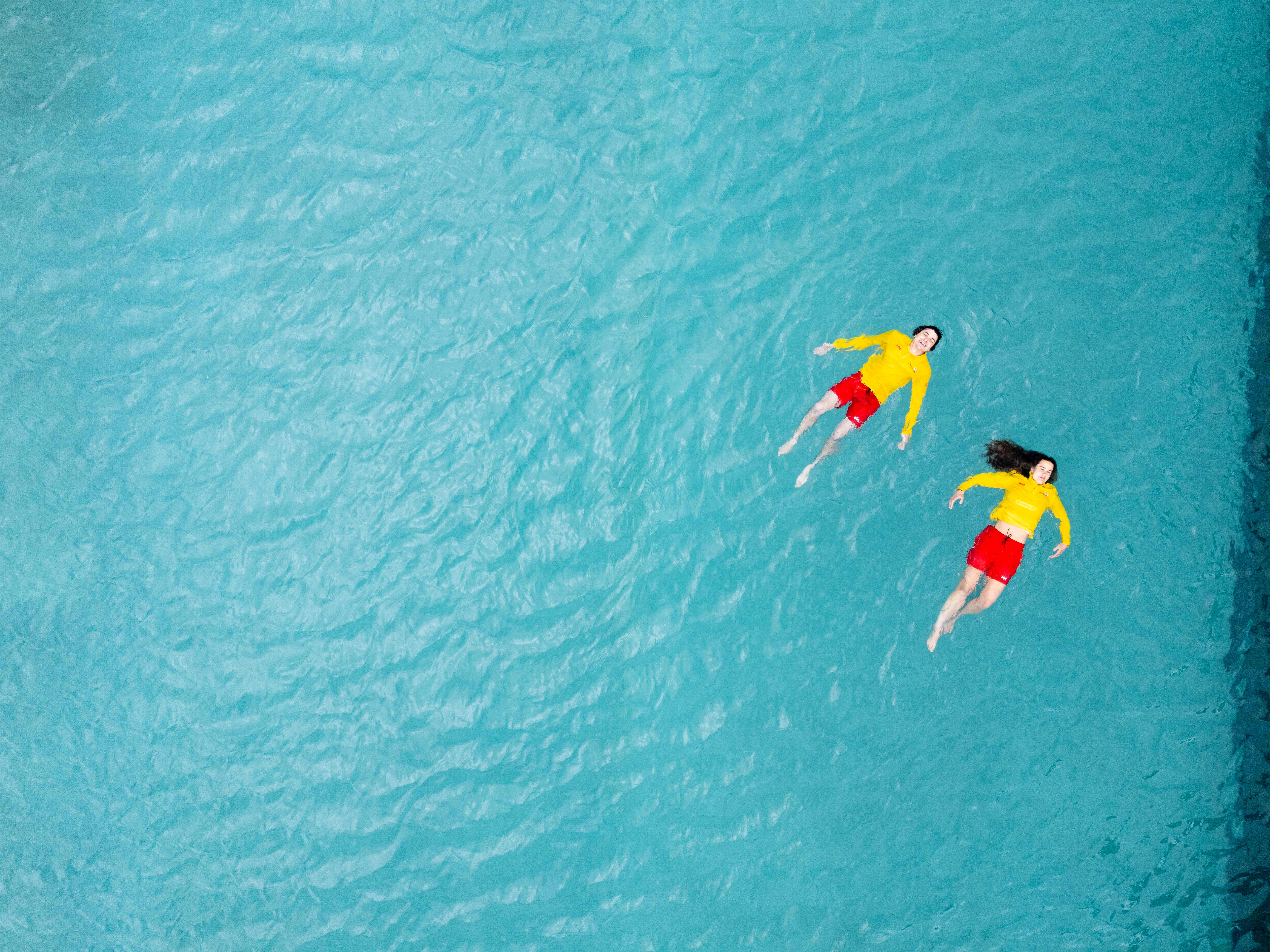 RNLI lifeguards showing Float to Live 