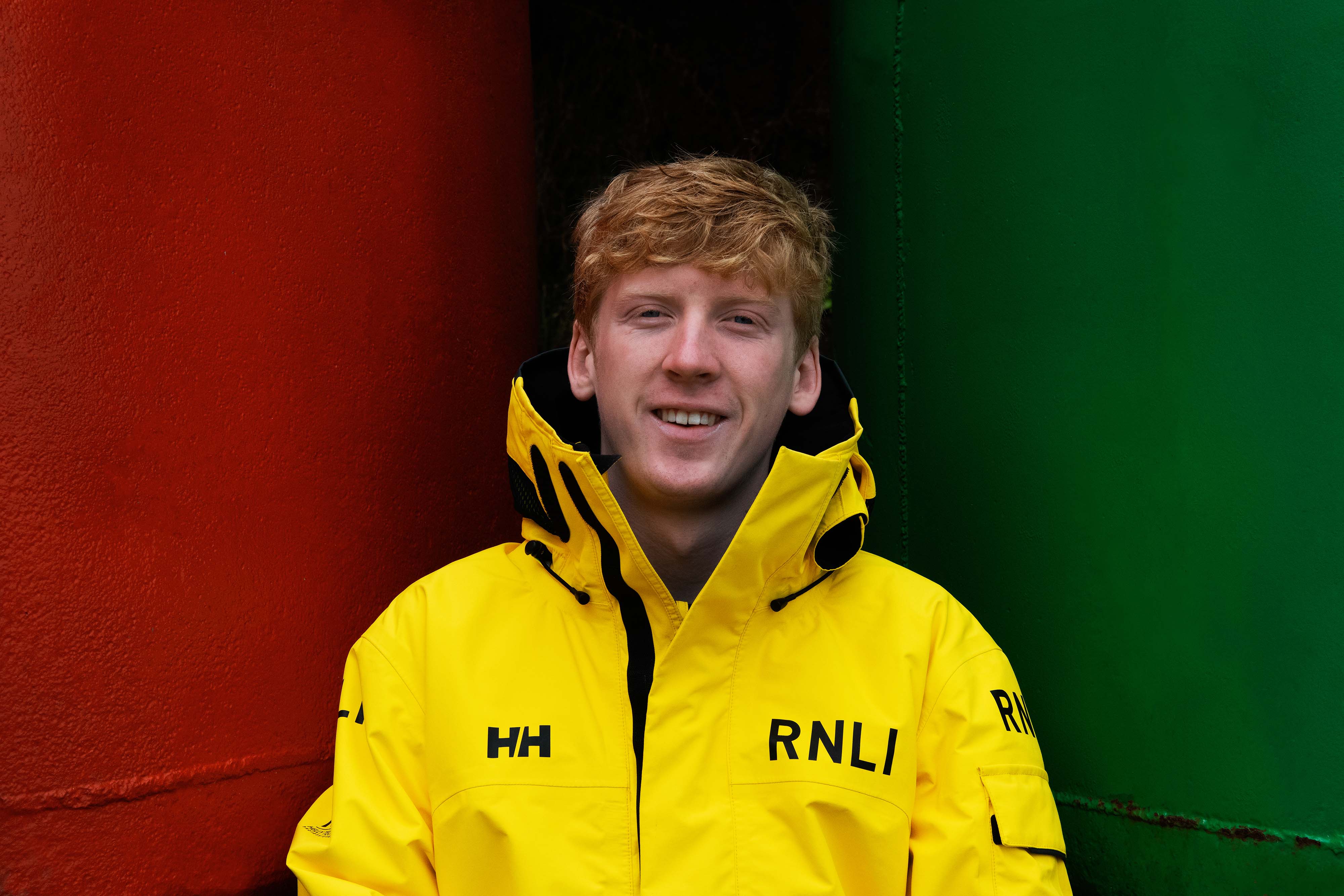 Photo of Adam Sweeney wearing crew jacket