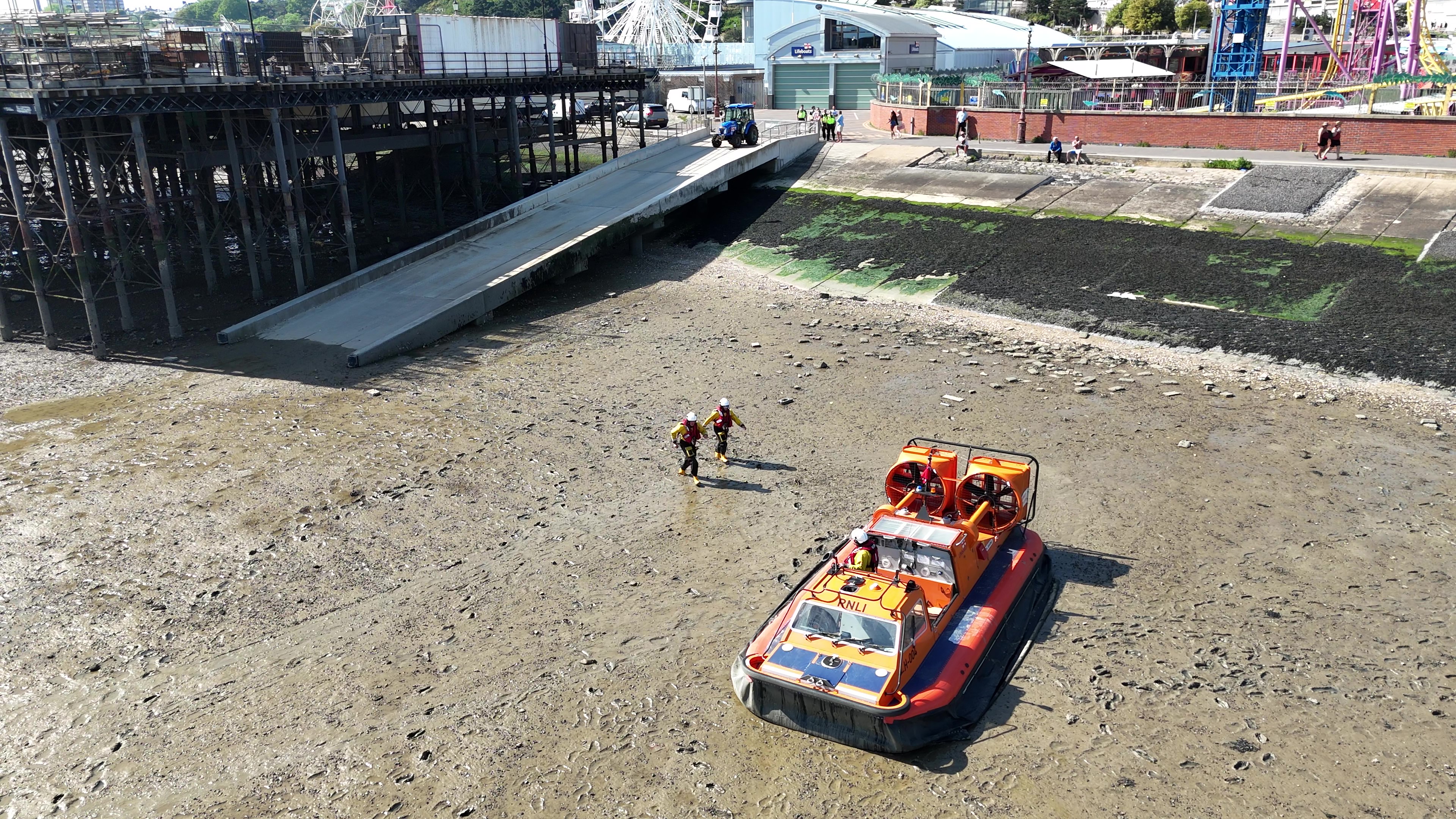 Southend volunteers running to the hovercraft for another shout