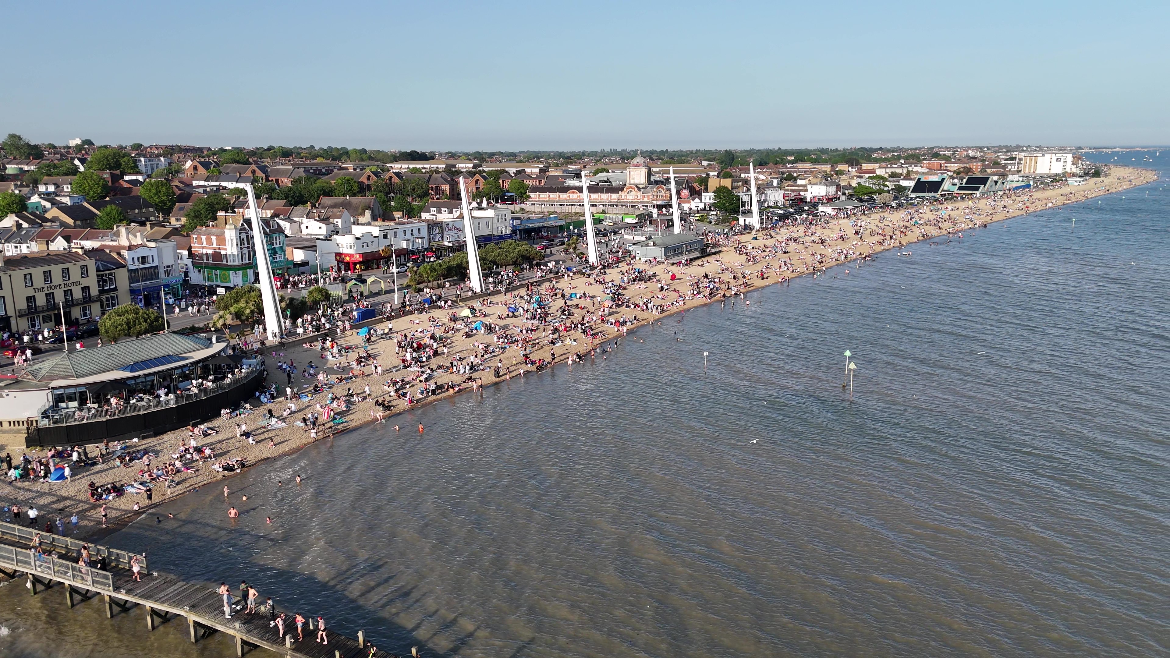Aerial view of Southend seafront and beaches packed with people