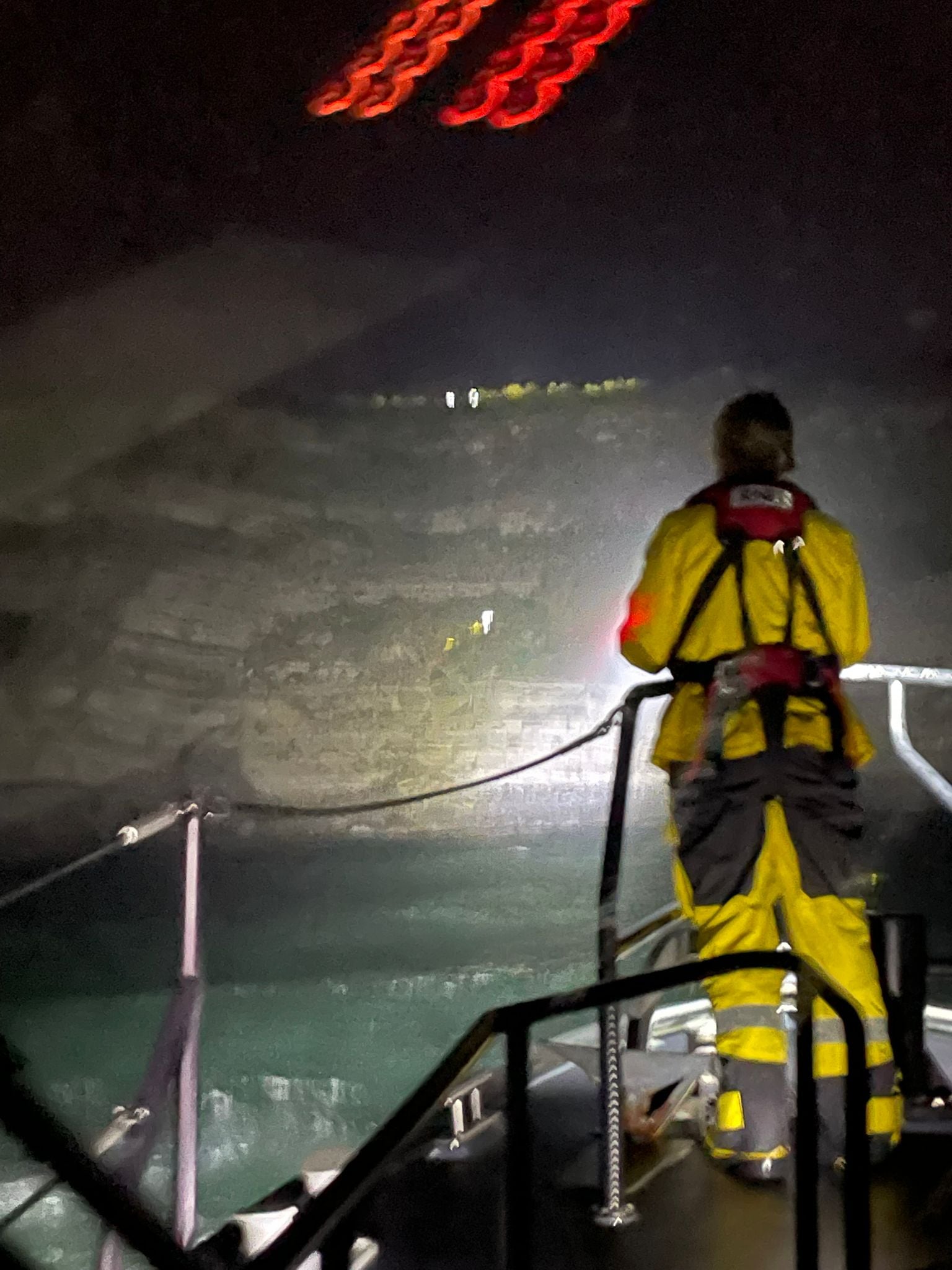 Swanage ALB standing by to illuminate the cliff as Coastguard rescue teams abseil down to fallen dog.