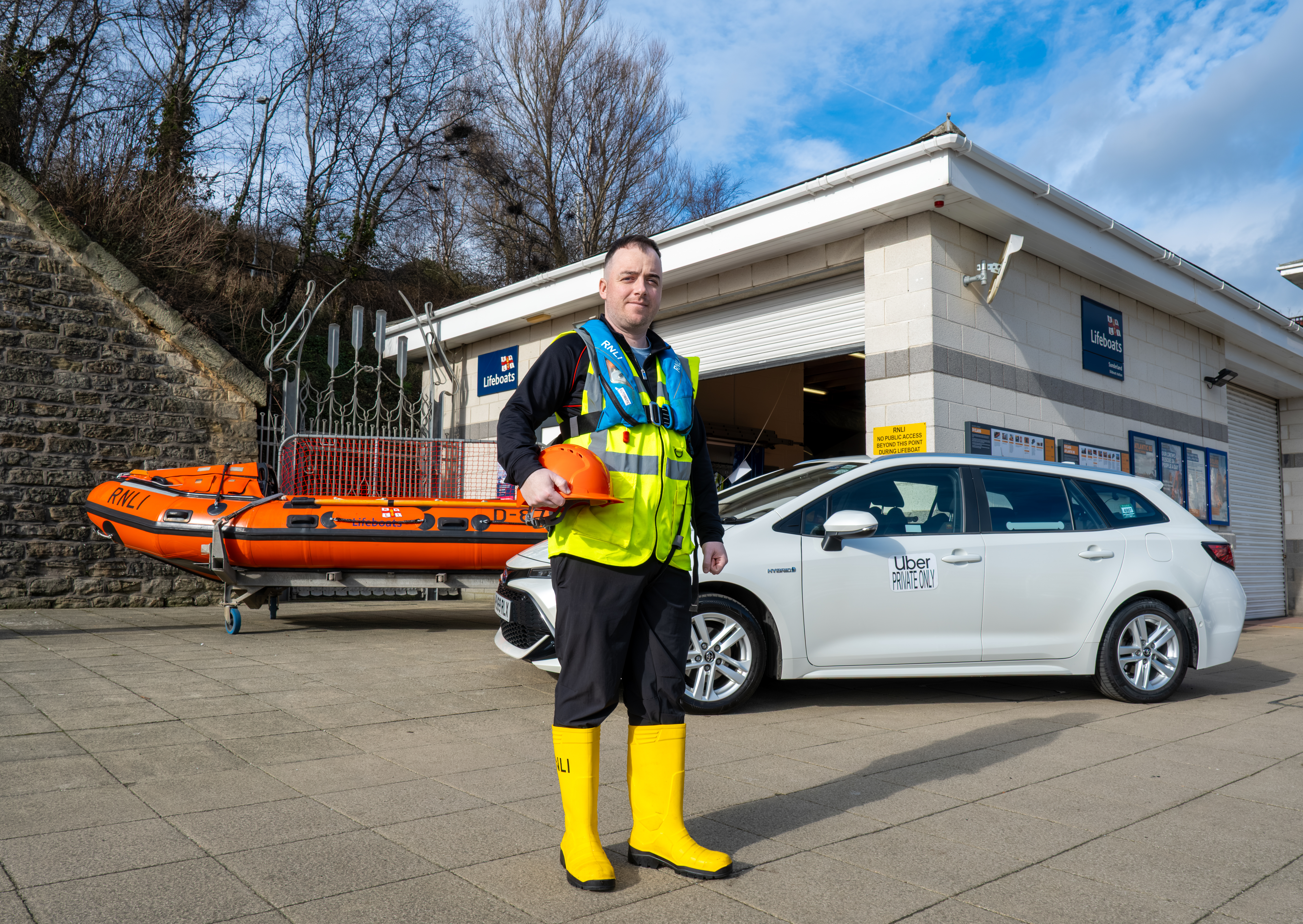 Simon photographed outside Sunderland RNLI with his Uber and the D Class Lifeboat.