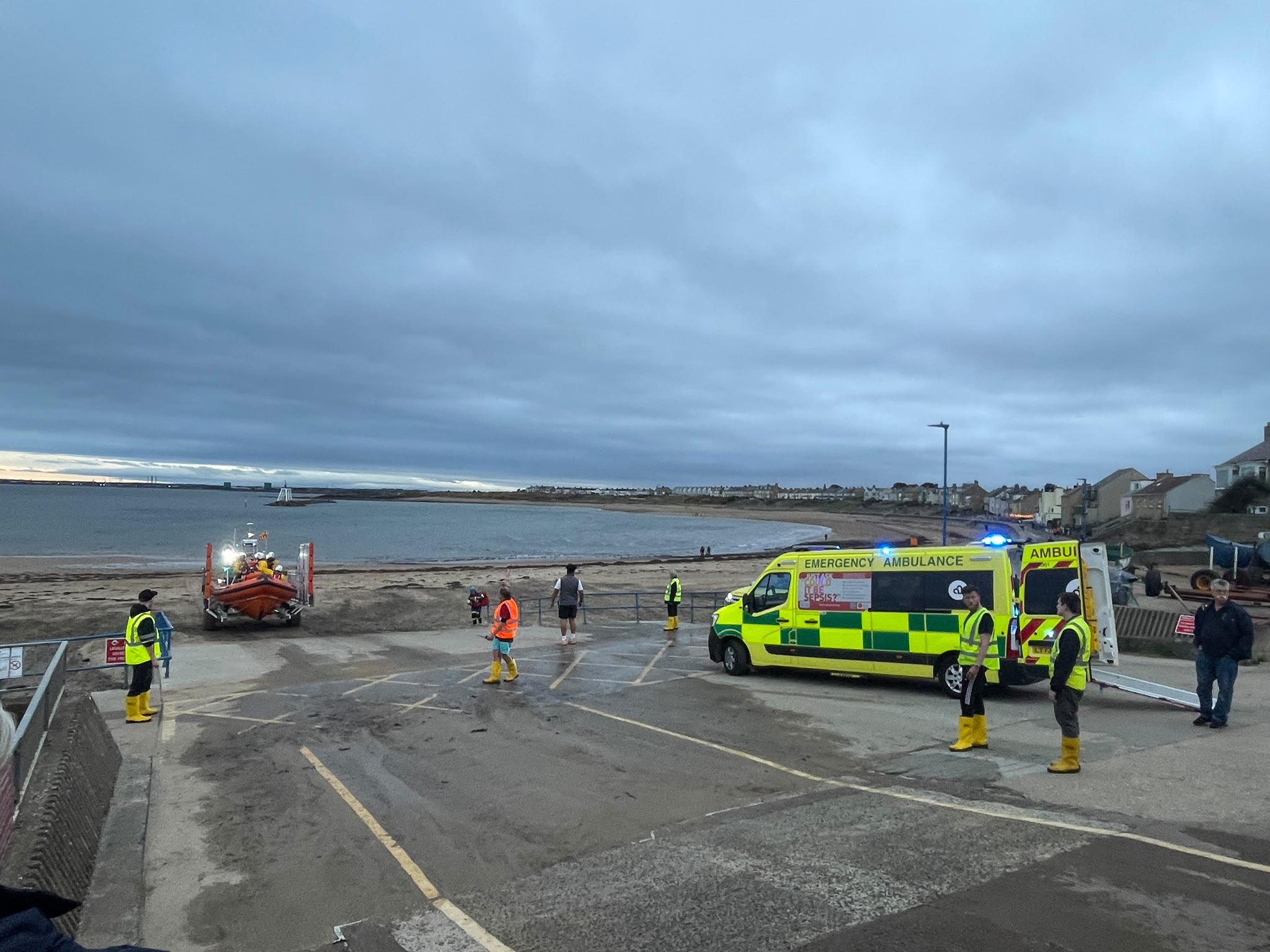 With ambulance team awaiting the casualty