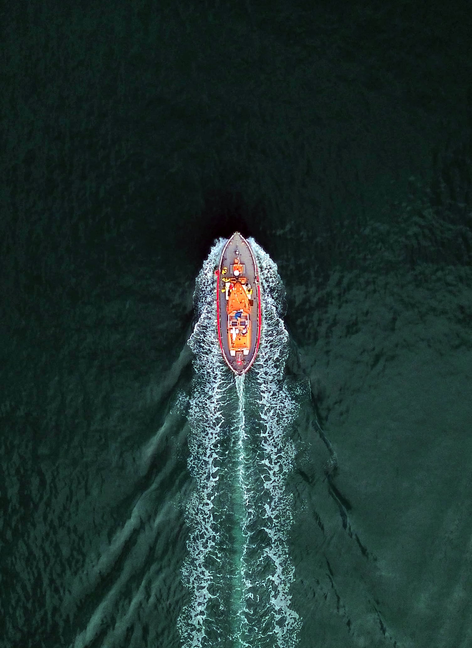 Picture shows a lifeboat under way