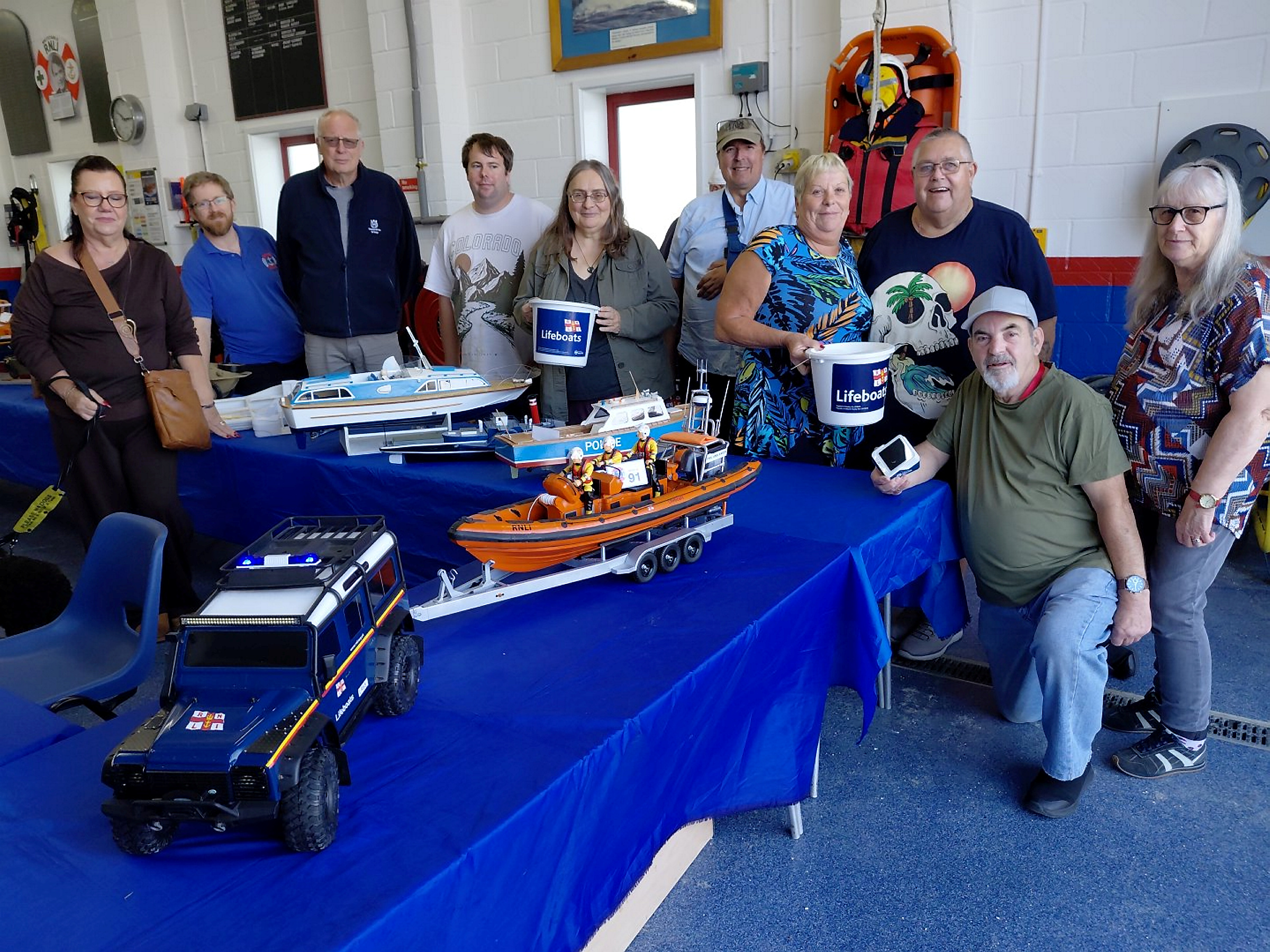 Members of the Heron Model Boat Club with part of their display at the Whitstable RNLI Boathouse on Sunday.