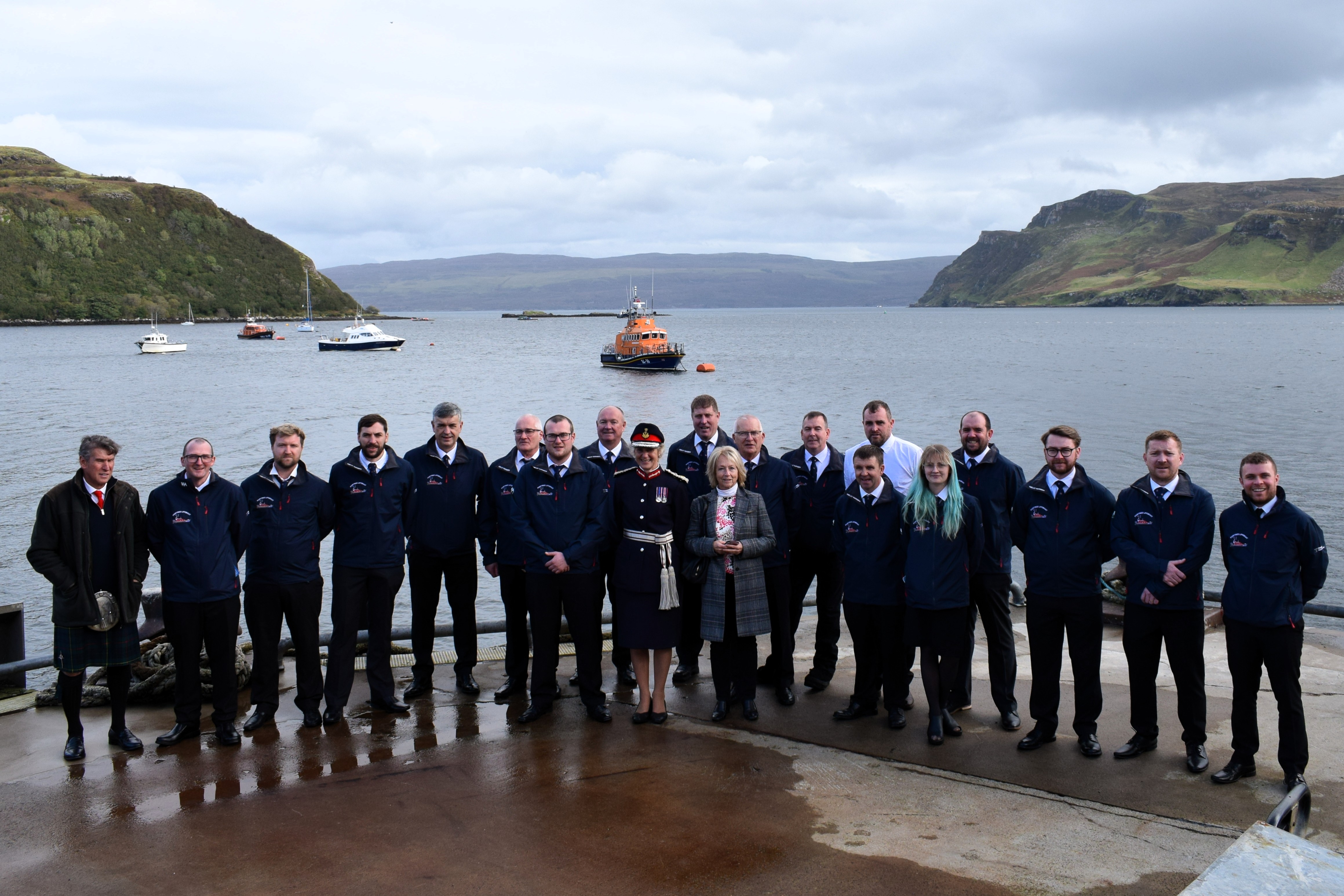 The Portree RNLI crew with Lindsey and Renton Doig, and Lord-Lieutenant of Ross and Cromarty Mrs Joanie Whiteford