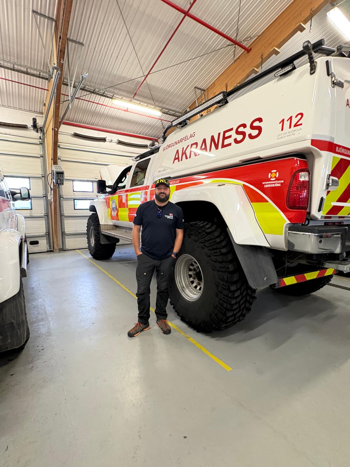 Gordon stood next to a Icelandic mountain rescue vehicle 