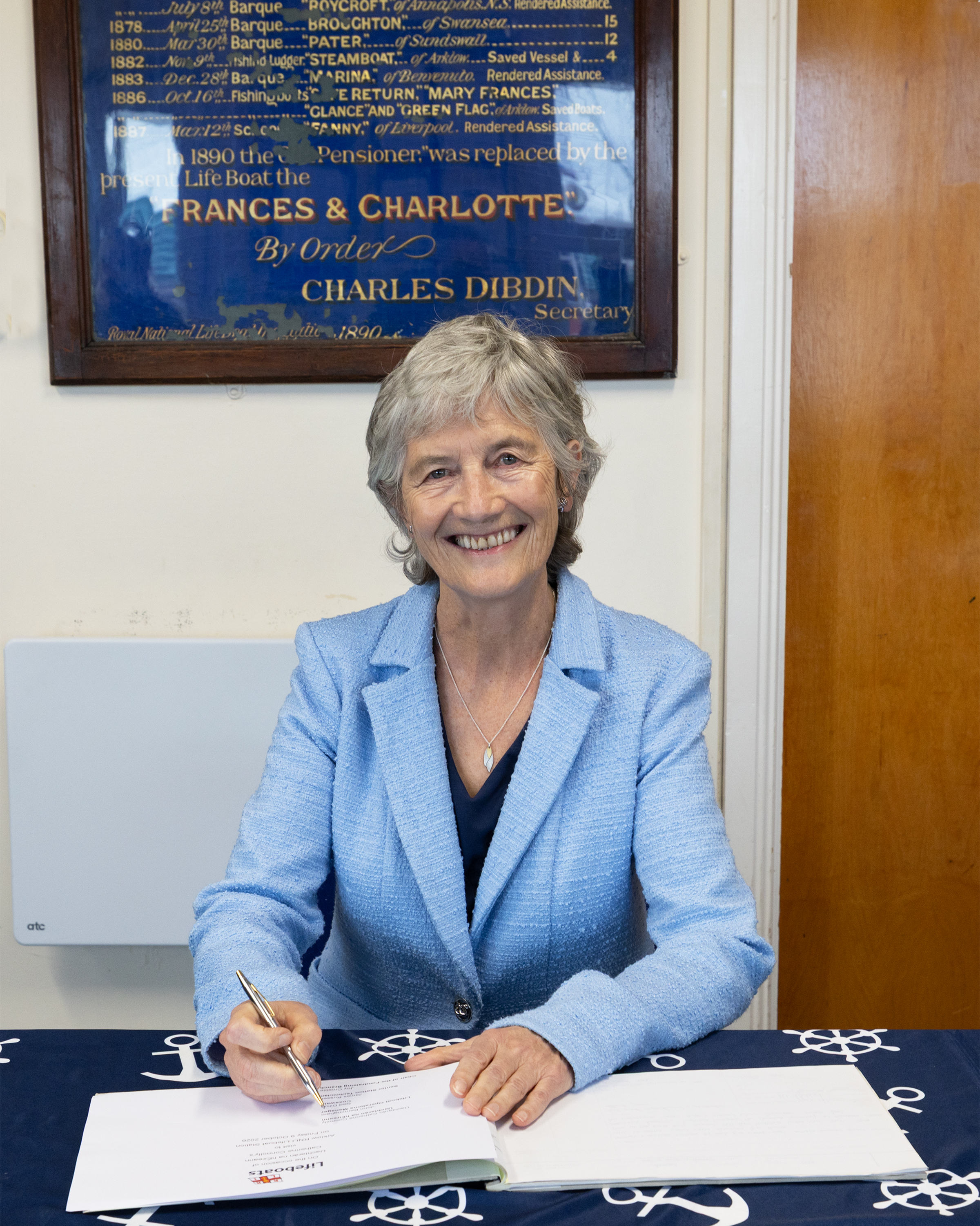 President Catherine Connolly signs the visitors book at Arklow RNLI