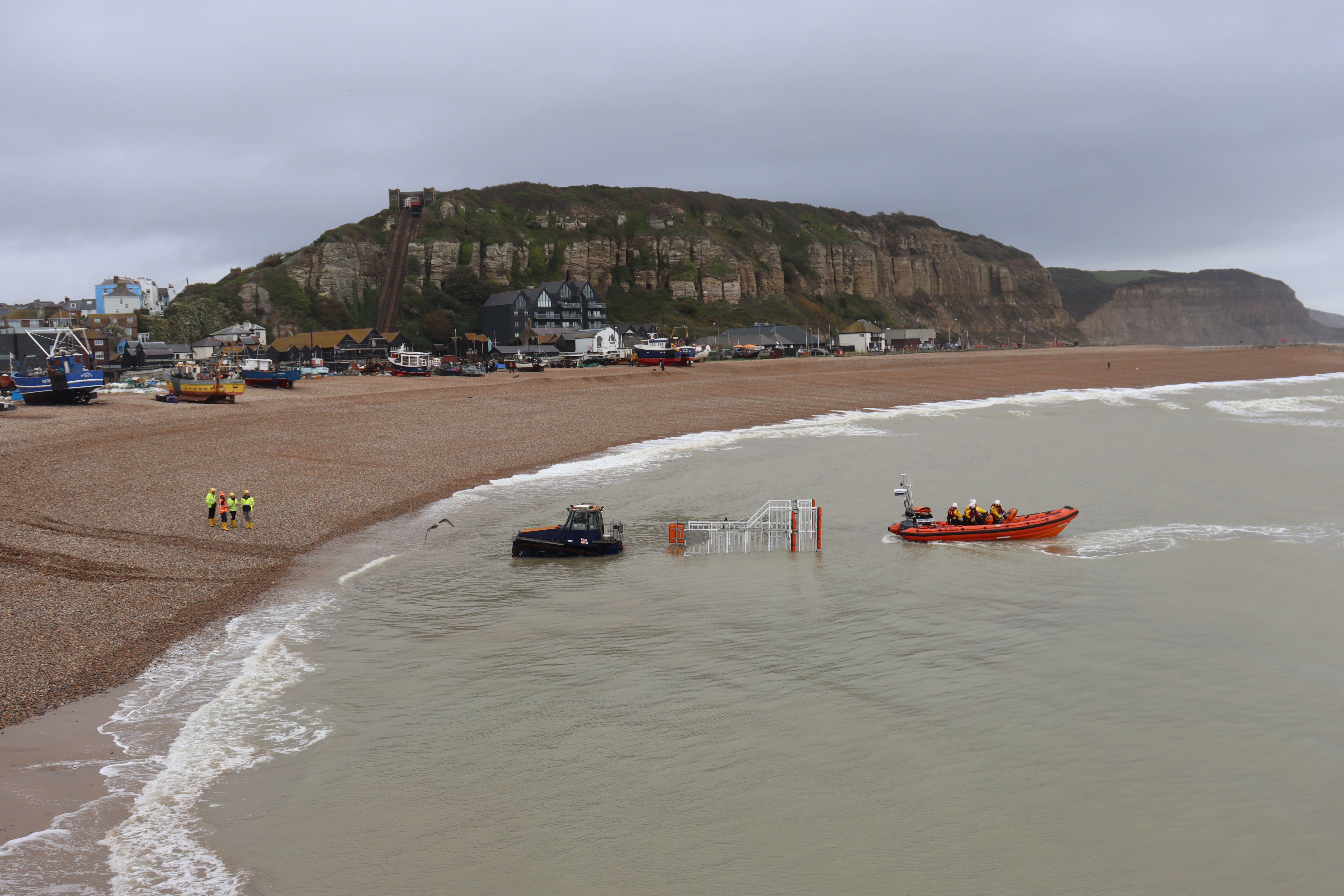 The lifeboat is carefully manoeuvered back into its trailer