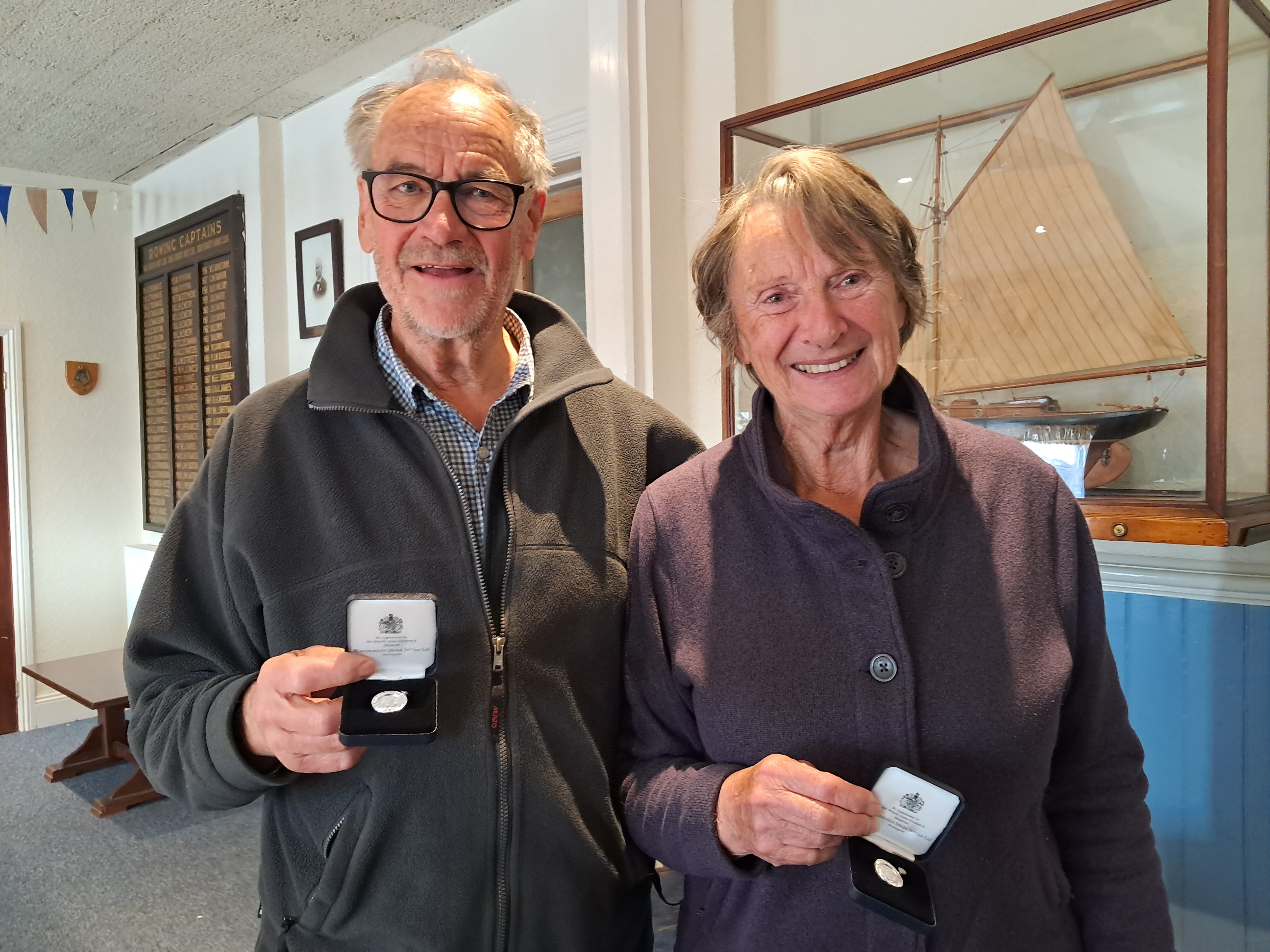 Tim and Mo Dorkin holding their 10yr Award 