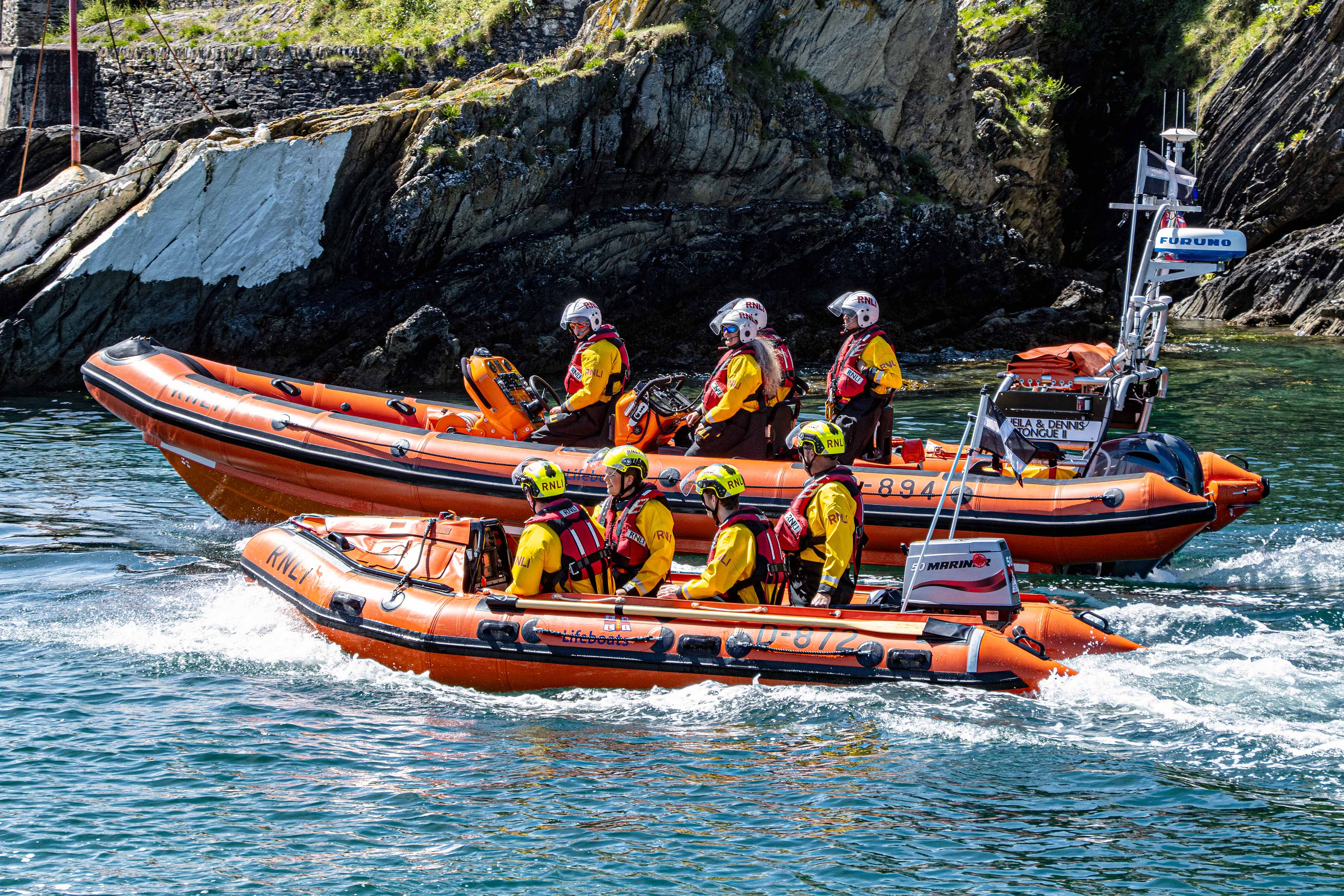 Stock image – Looe RNLI’s Atlantic 85 and D Class inshore lifeboats heading out into Looe bay