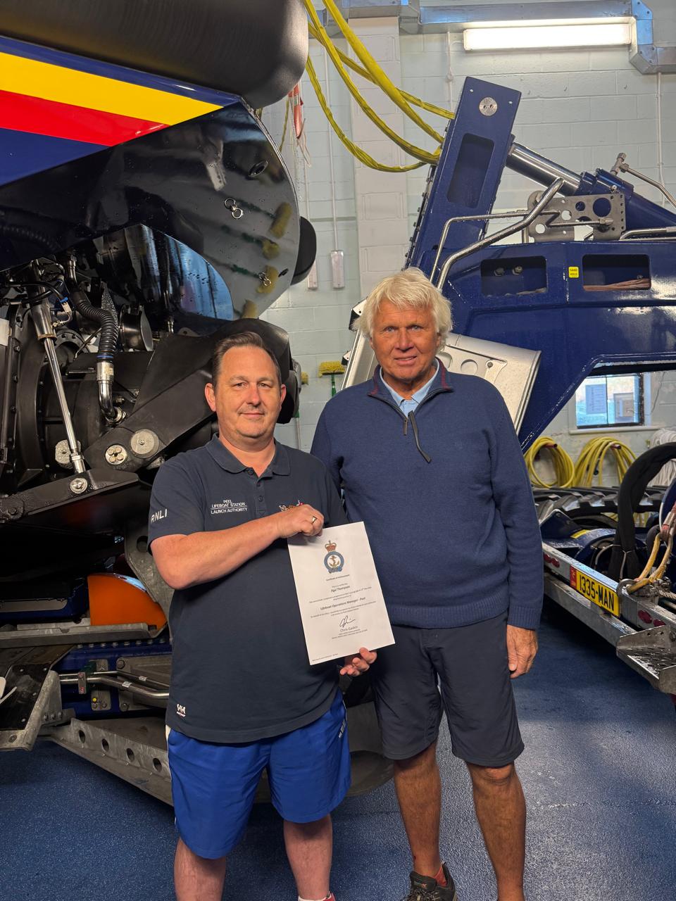 Allen Corlett handing over the reigns to Paul Thompson