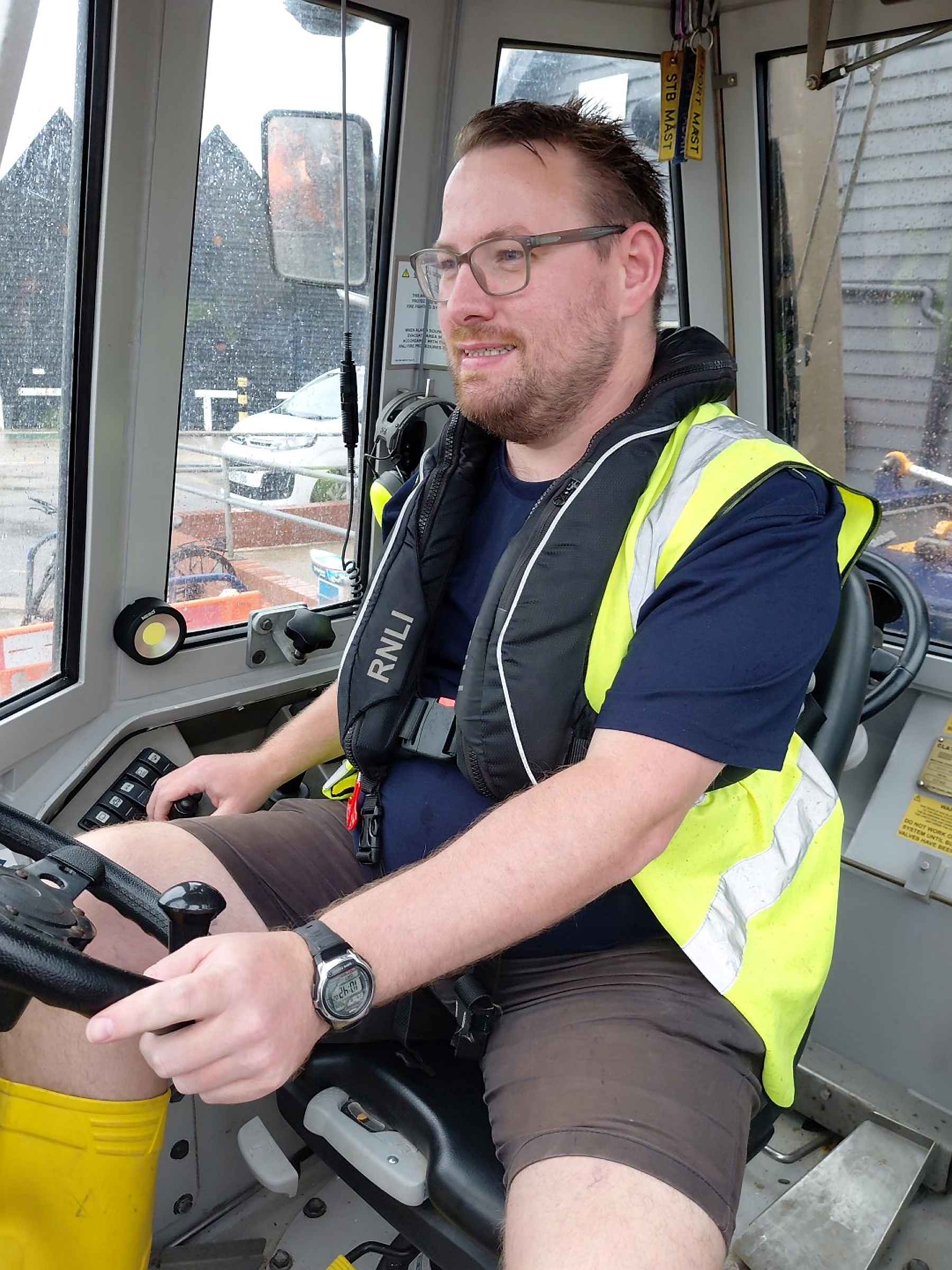 Liam Masters at the controls of the Talus M3 launch tractor at Whitstable RNLI.