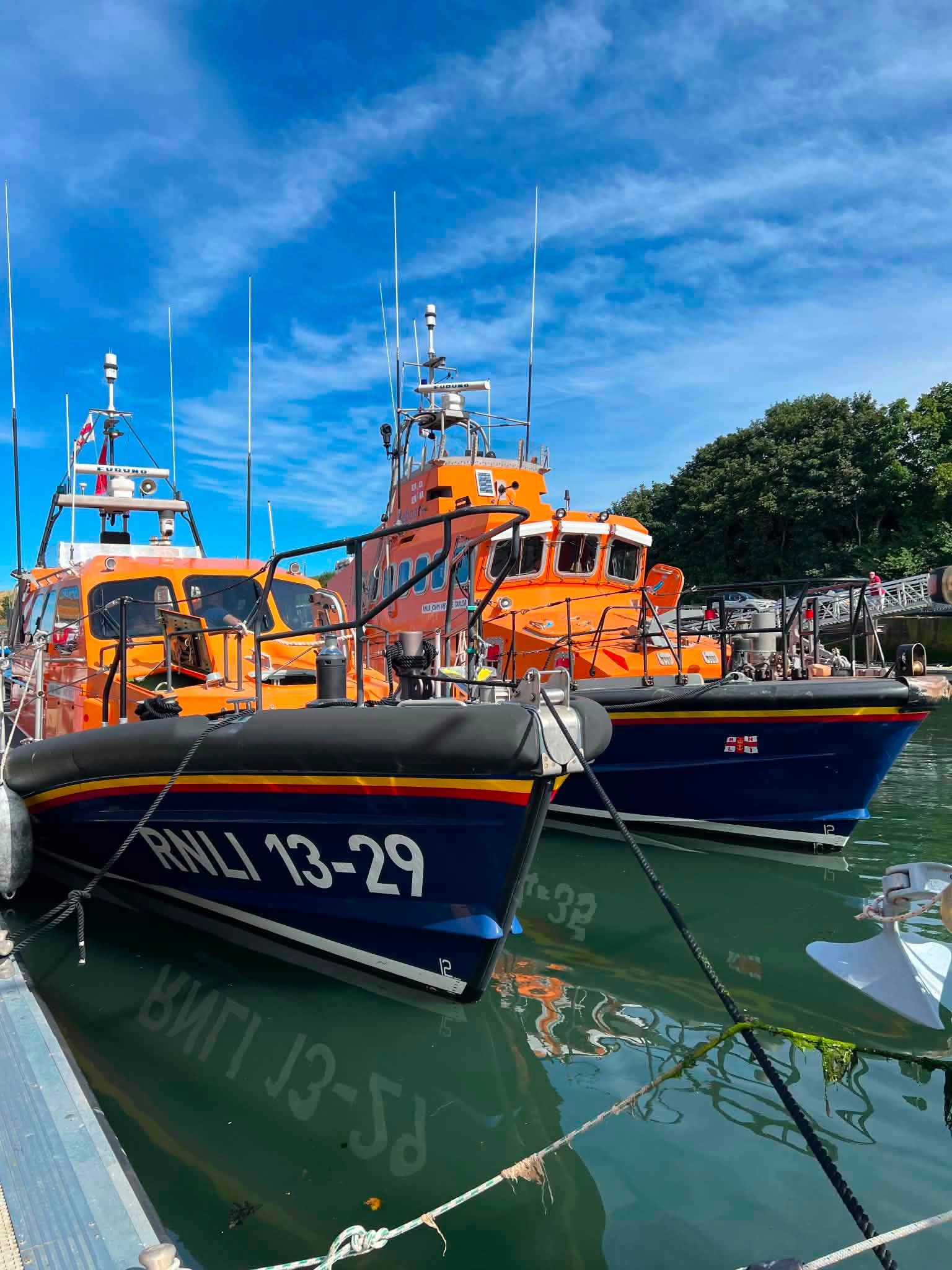 Two lifeboats tied up.