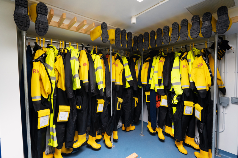 Image of RNLI yellows hanging in the new kit area