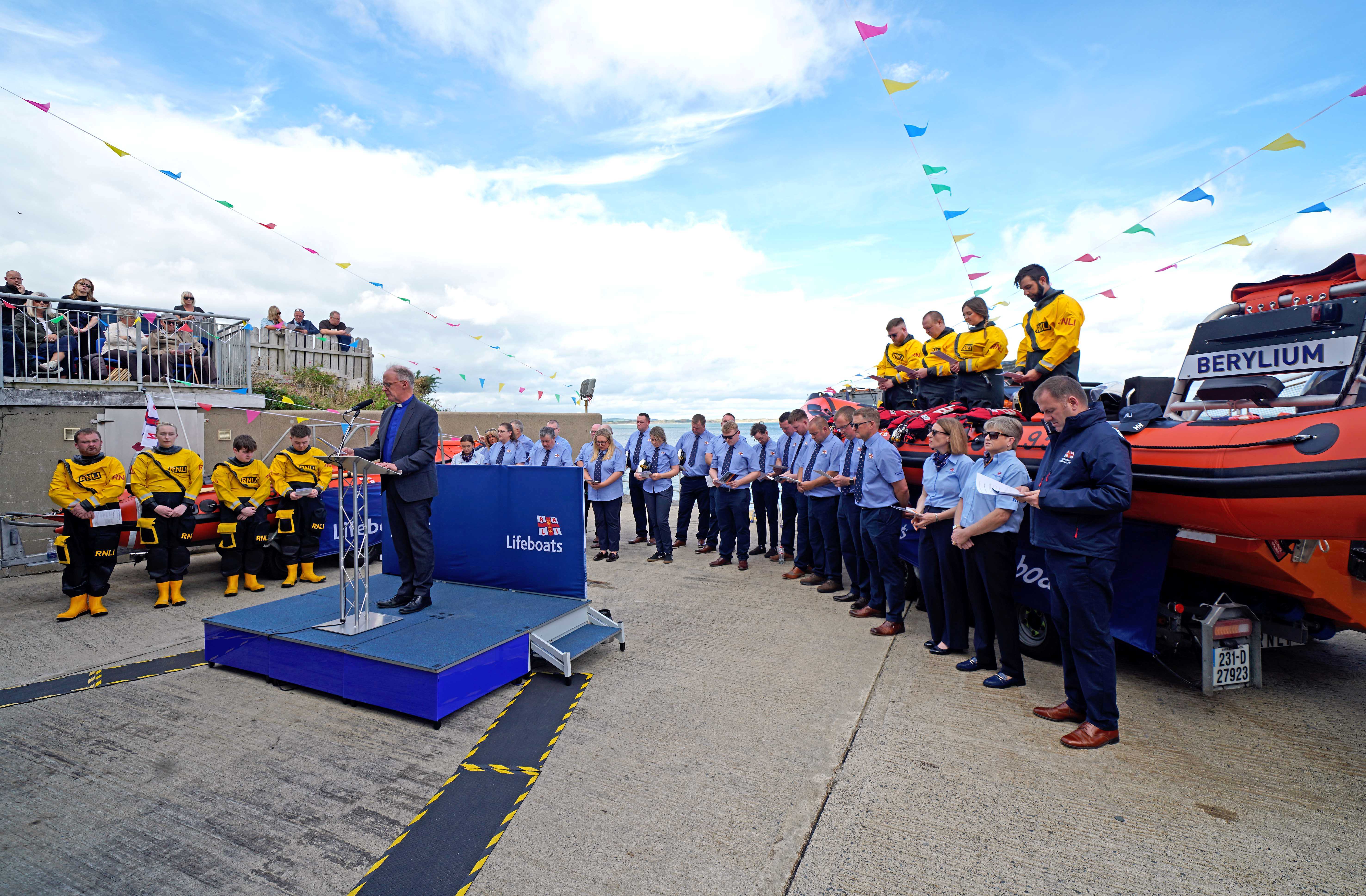 Newcastle RNLI volunteers alongside their new lifeboats at the naming ceremony