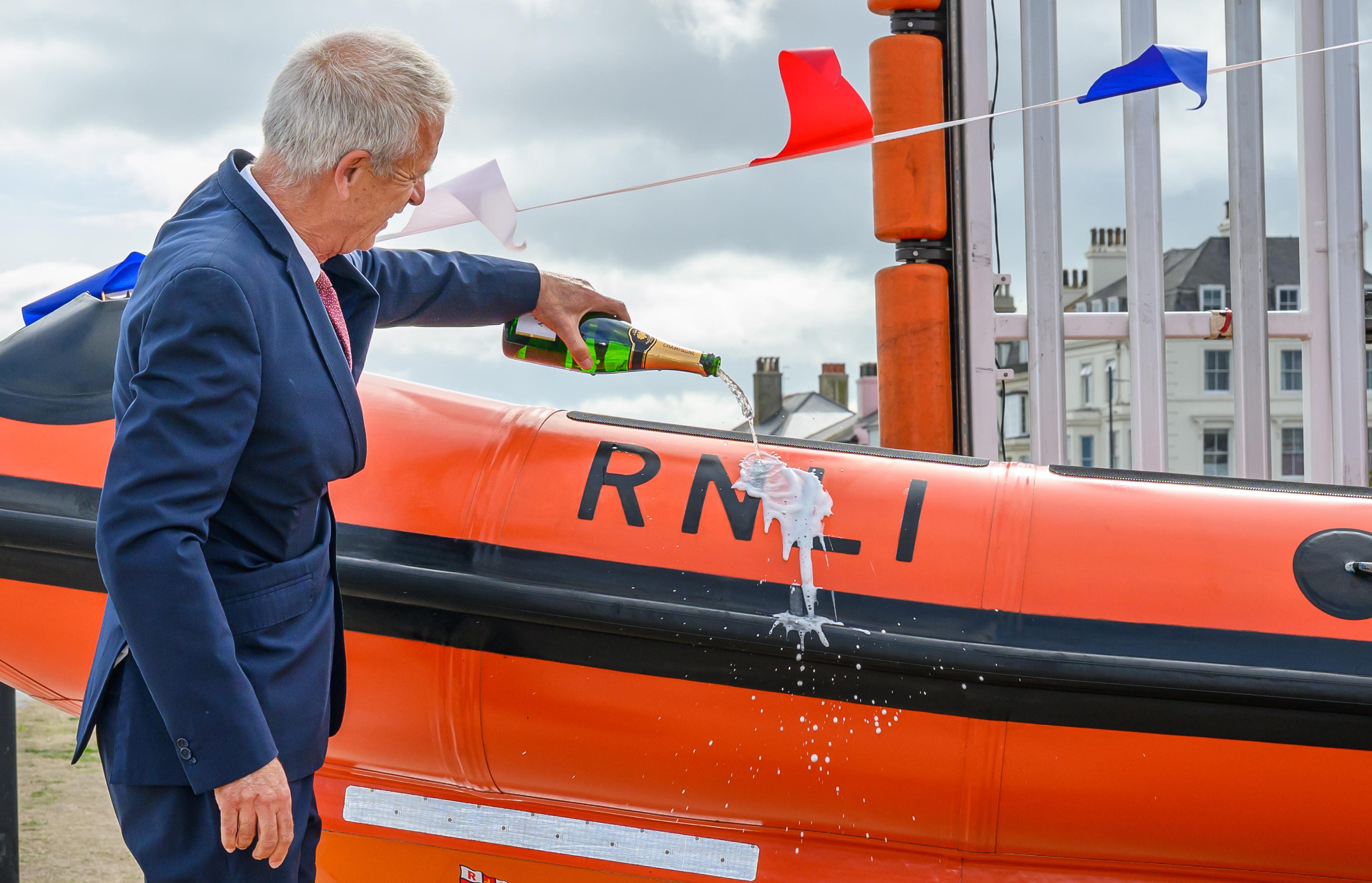 Donor representative Nick Fry dedicates the lifeboat.