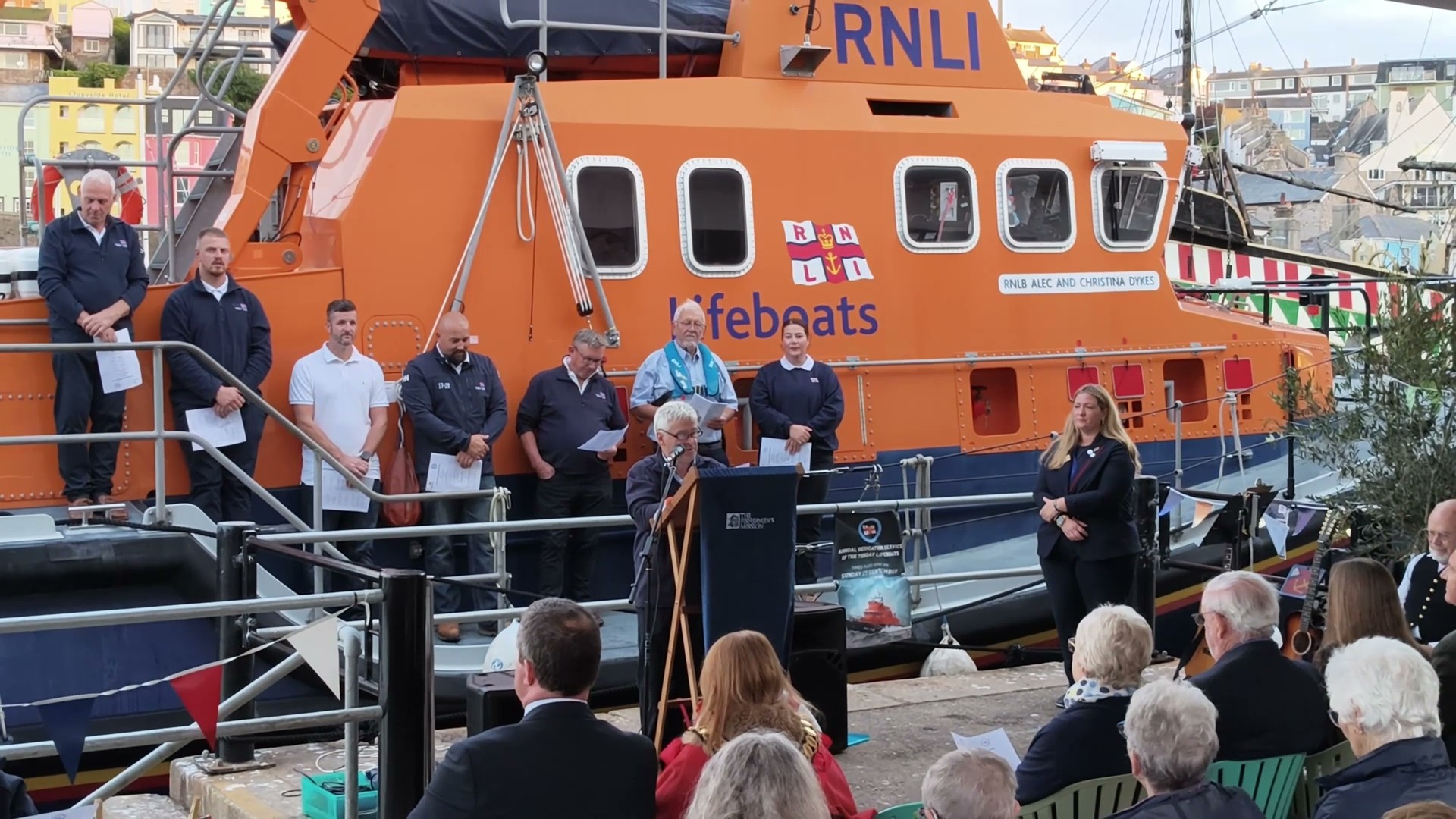 Reading being given by Richard Fowler, Coxswain, Torbay RNLI