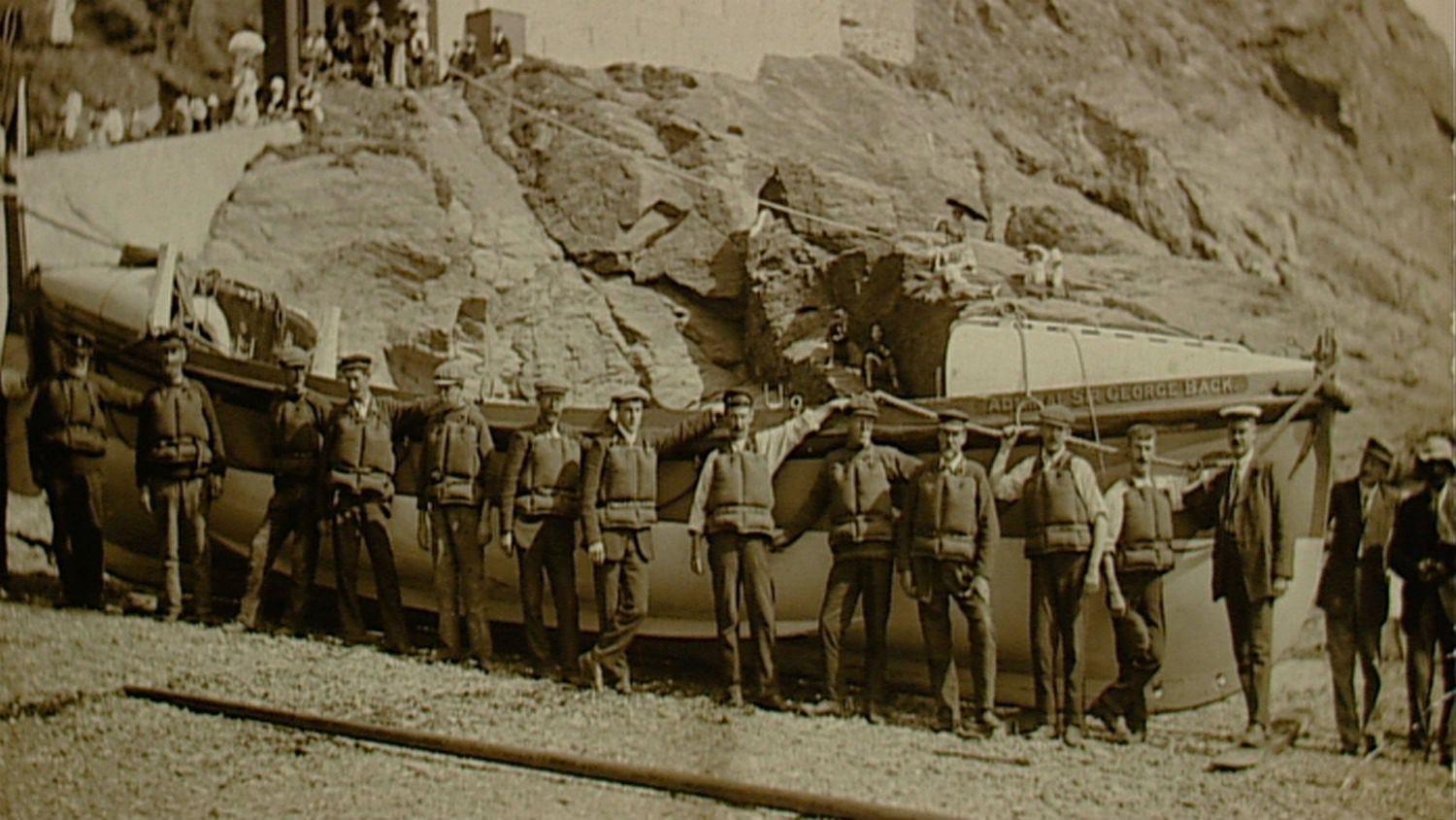 Volunteers from The Lizard standing next to their lifeboat, Admiral Sir George Back, in 1907.