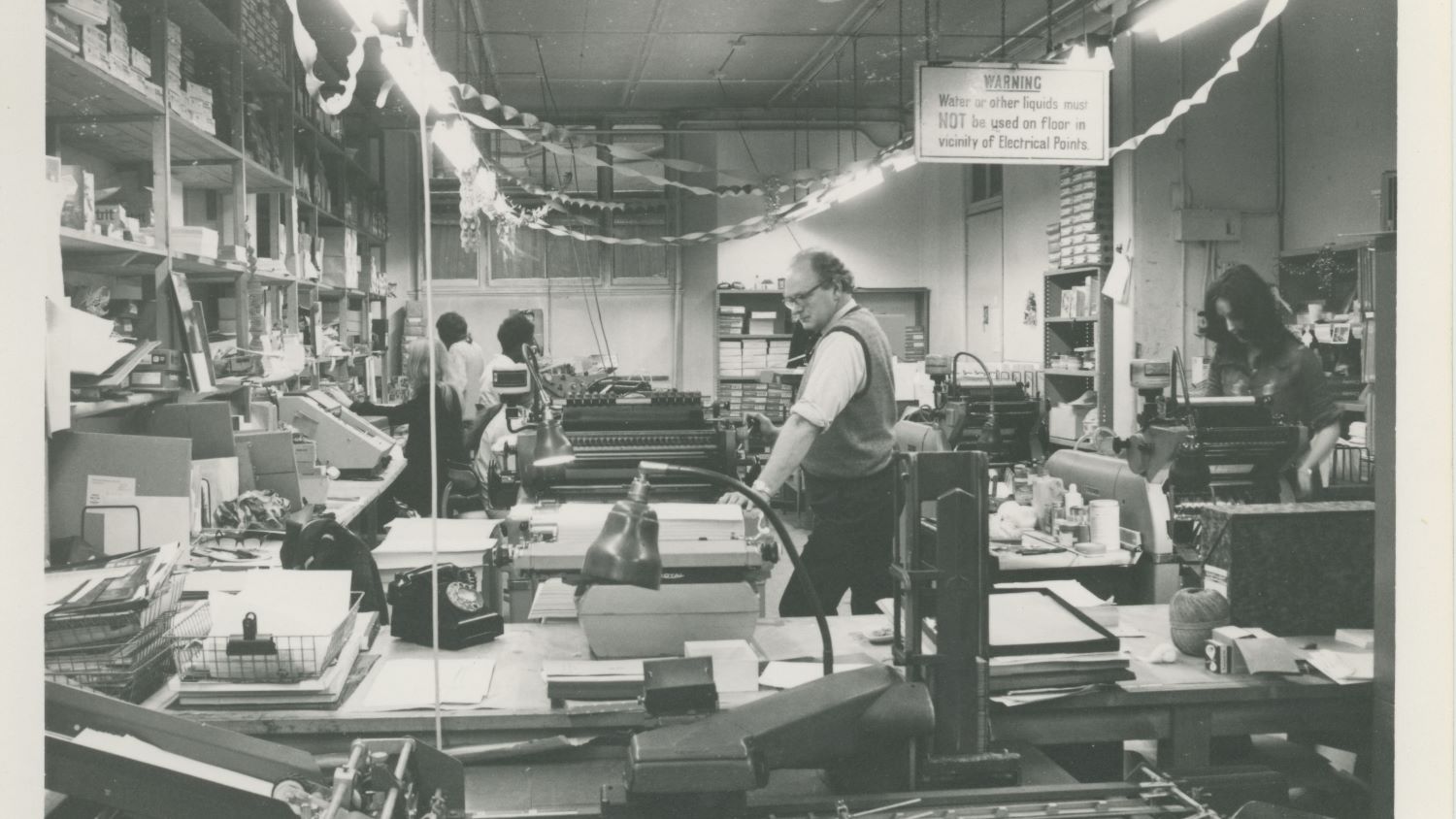 Black and white image of Print Room at RNLI Head Office, decorated for Christmas