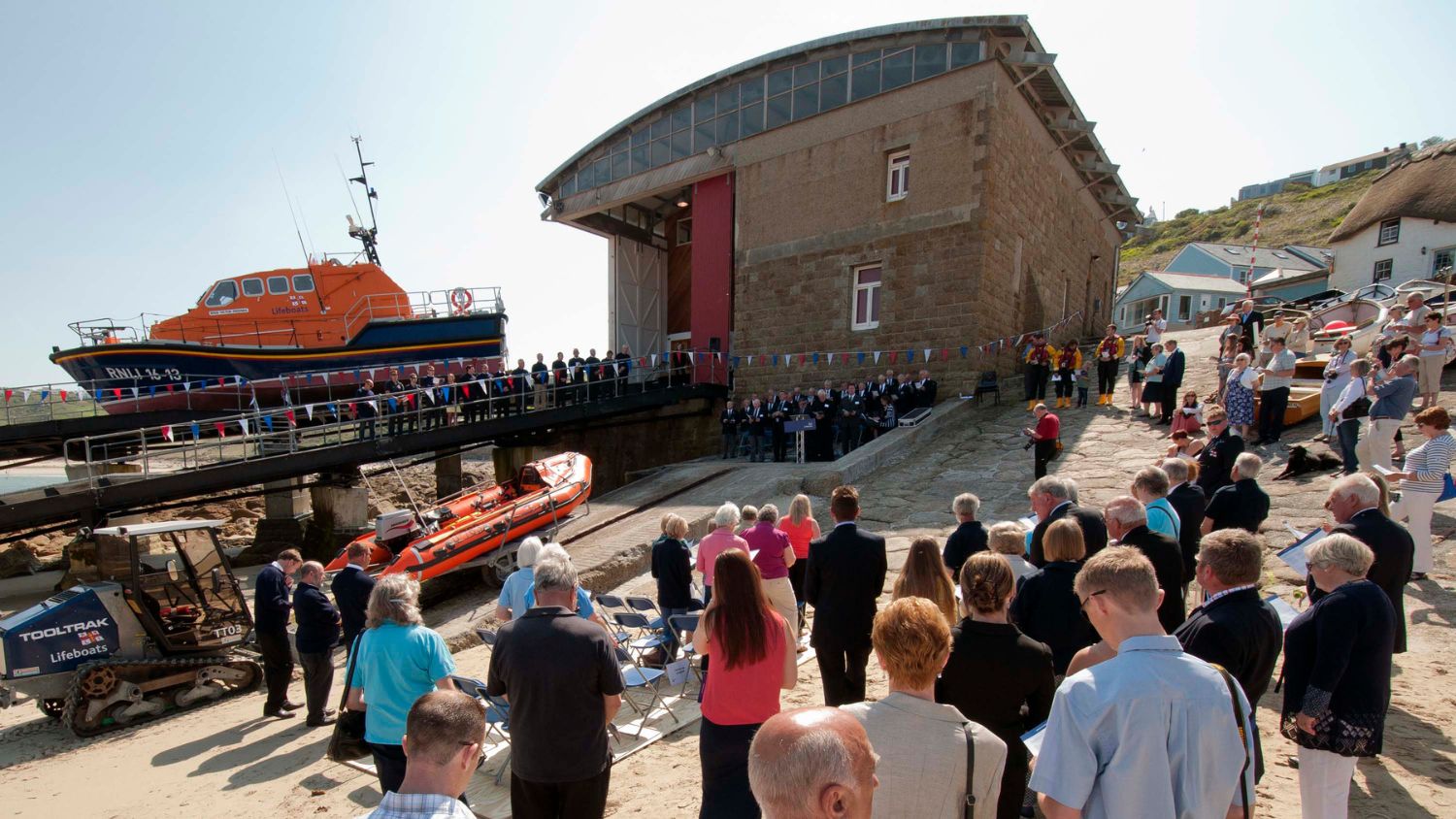 The St Buryan Male Voice Choir led in singing outside the Sennen Cove RNLI lifeboat station during the naming ceremony of the D-class inshore lifeboat Amy Brown D-763.