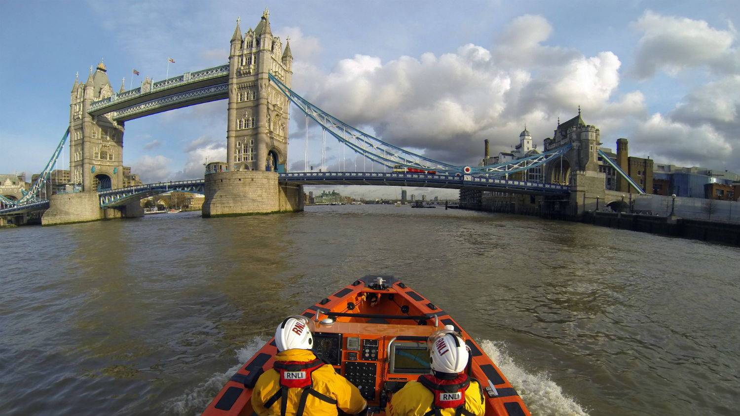 Tower's E class lifeboat, Hurley Burley, heading along the Thames towards Tower Bridge