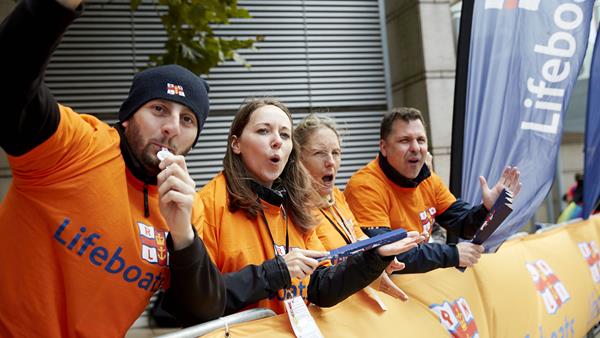 The RNLI Cheer Team shout encouragement at the marathon runners