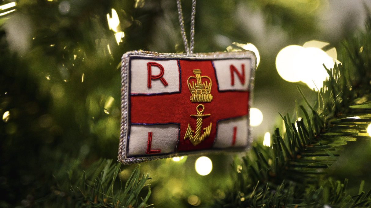 RNLI Christmas tree decoration hanging on a Christmas tree.