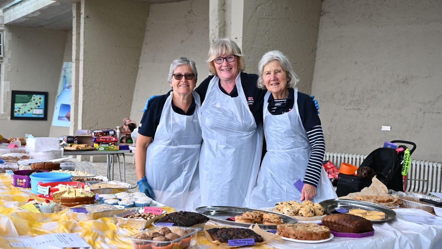 RNLI volunteers running a cake stand