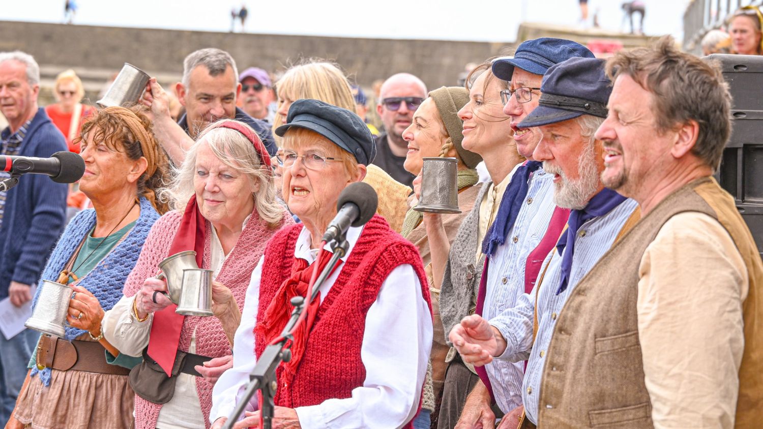 Sea shanty singers outside Lyme Regis lifeboat station