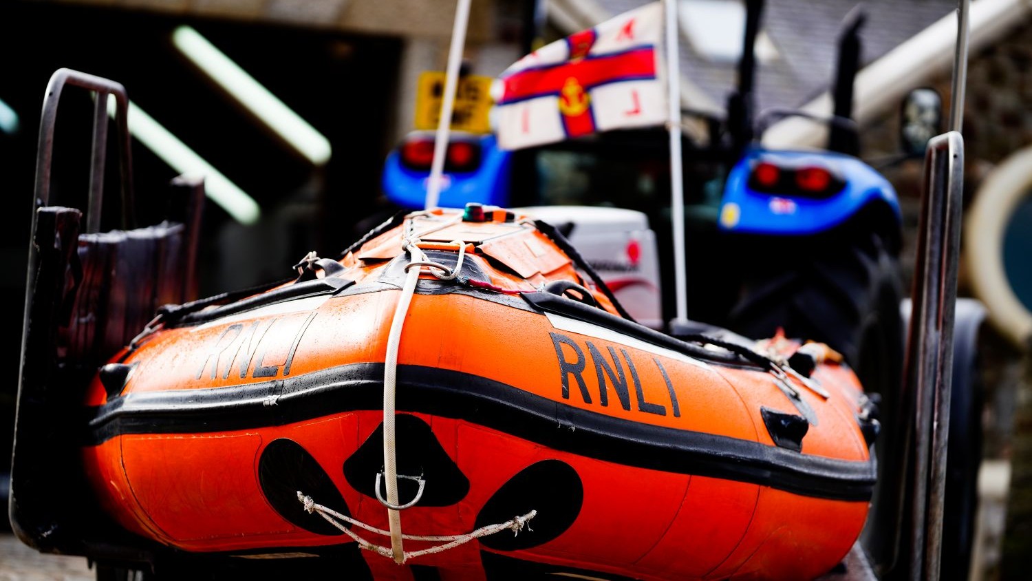 A small orange rib on its tractor trailer.