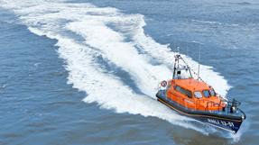 Drone image of Barry Dock's Shannon class at speed on the water