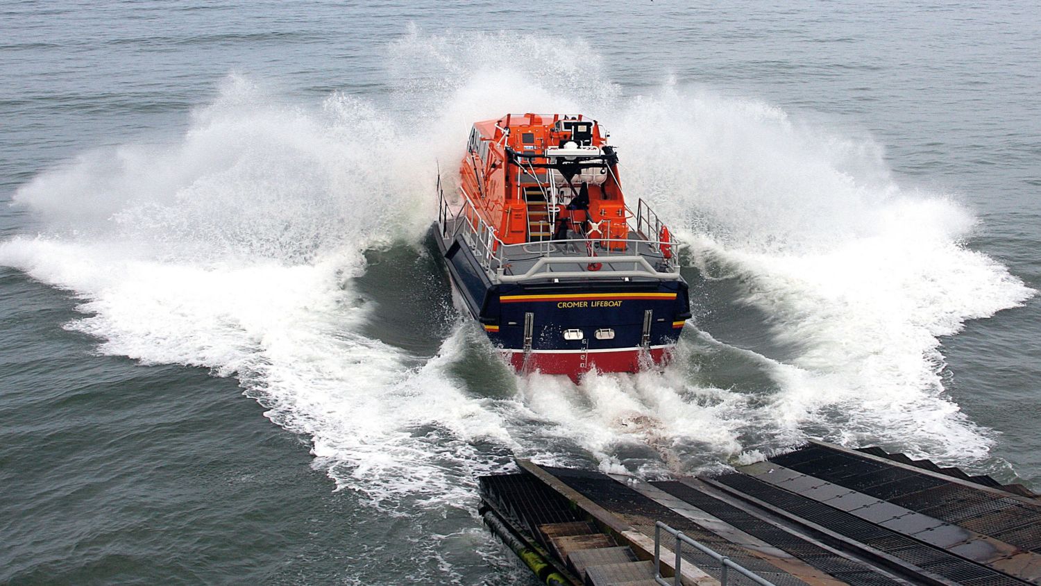Cromer Tamar class lifeboat Lester 16-07 being launched down the slipway following her naming ceremony.