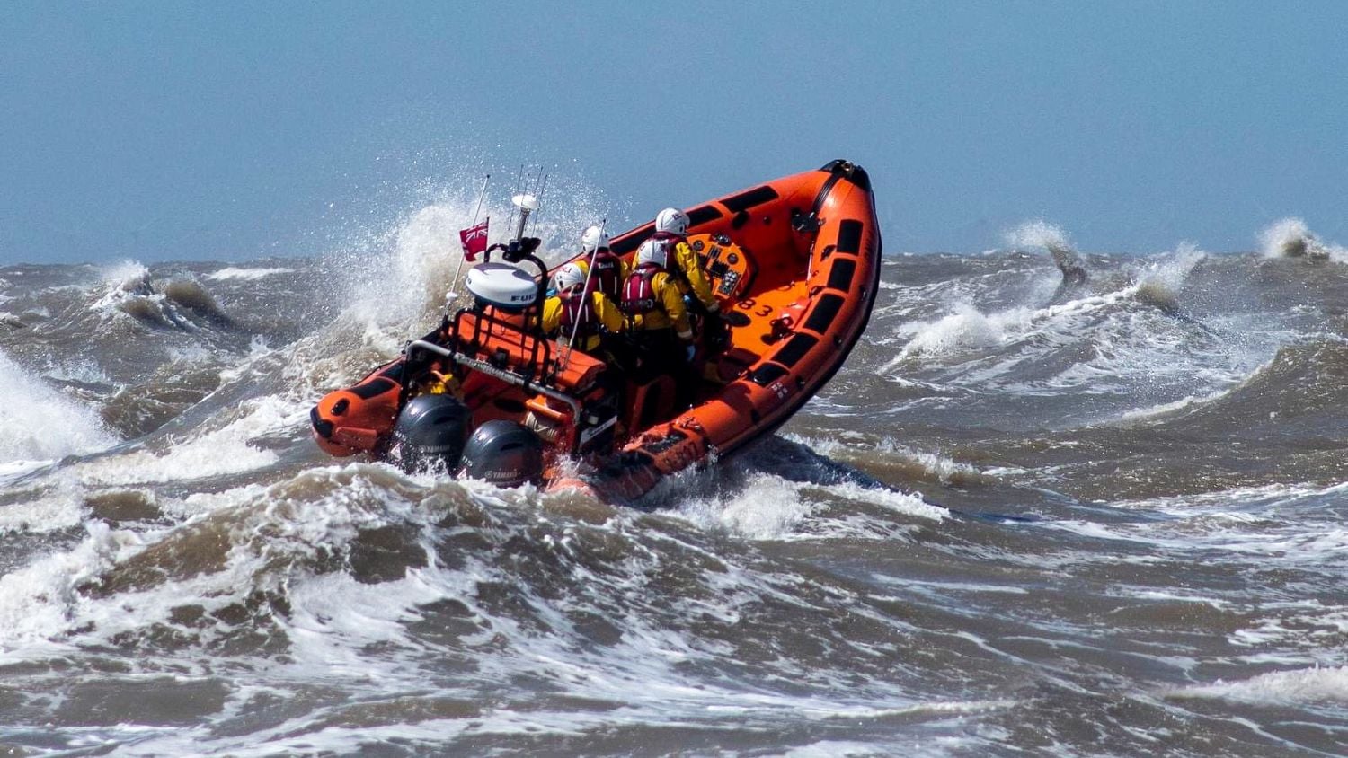 The Charles Dibdin on a call to rescue two people and a dog in choppy seas