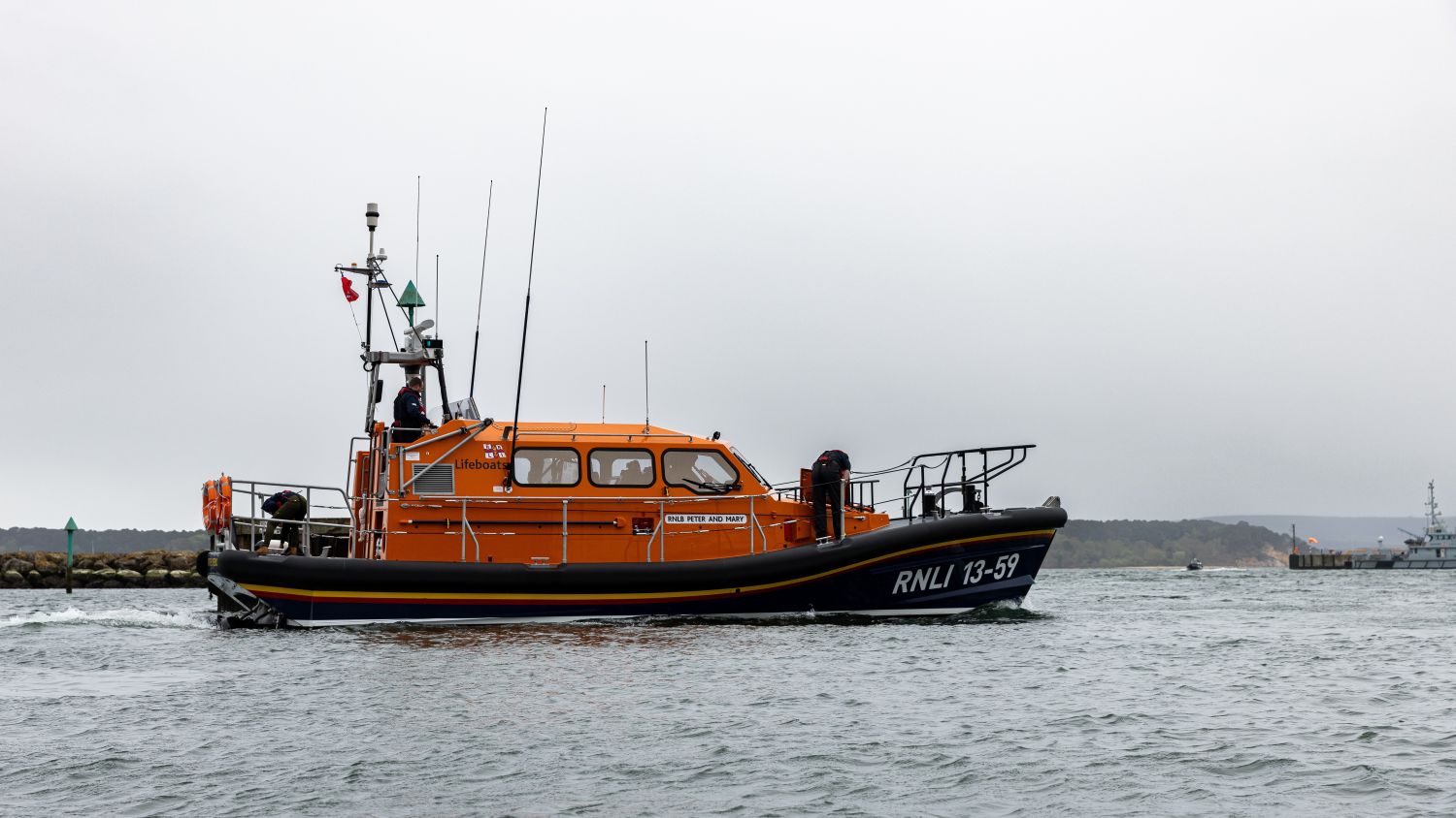 Portree Shannon class all-weather lifeboat Peter and Mary 13-59 leaving the All-Weather Lifeboat Centre (ALC) in Poole to head to station.