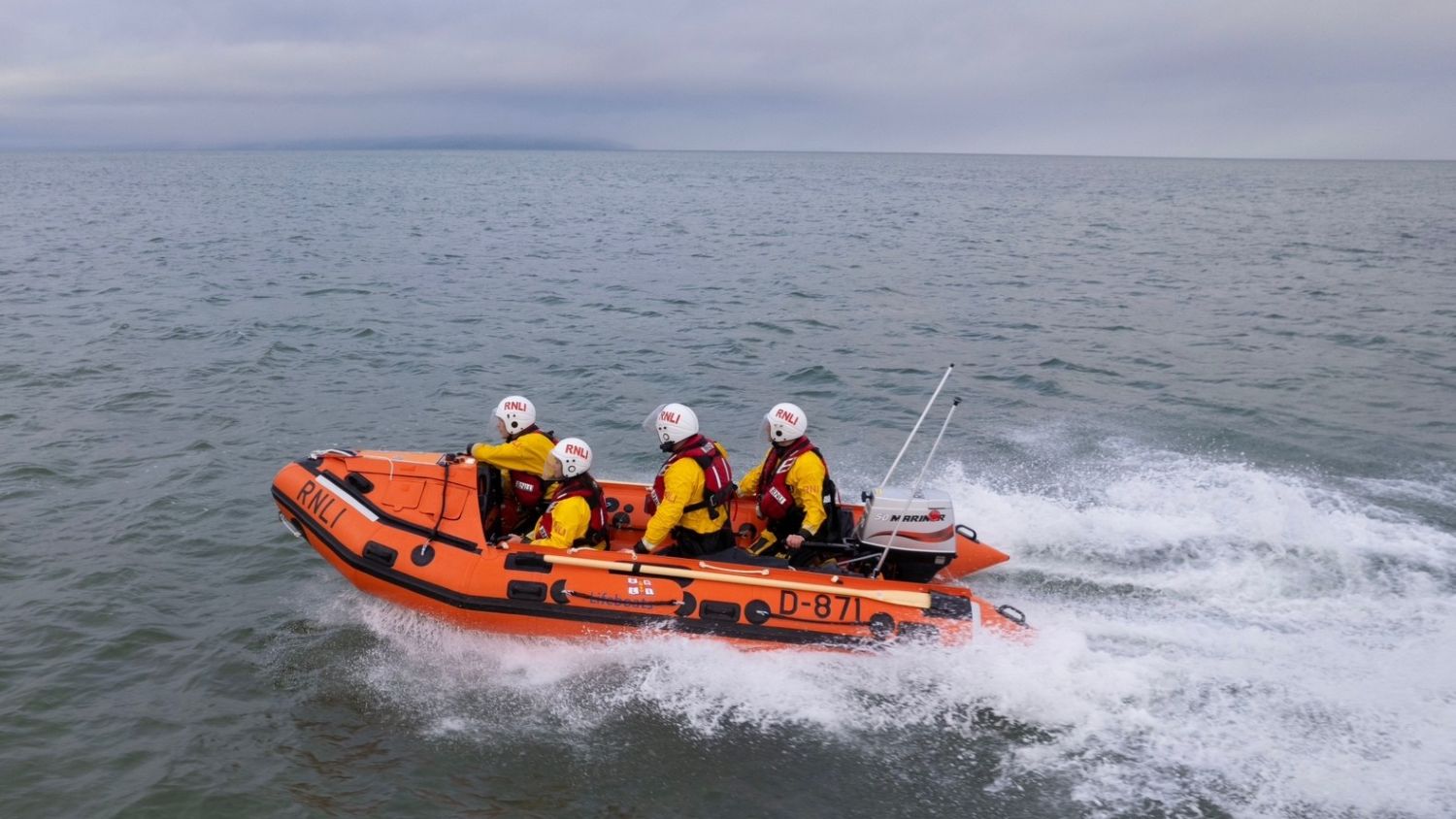 Aerial drone photo of Portrush D-class inshore lifeboat The Ken Blair D-871 at sea during a training exercise.