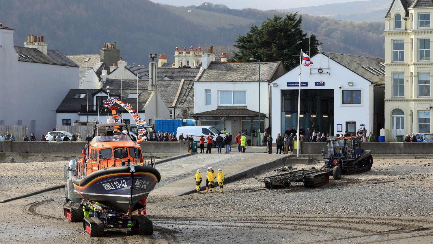 Ramsey Lifeboat Station with a lifeboat being recovered in the foreground