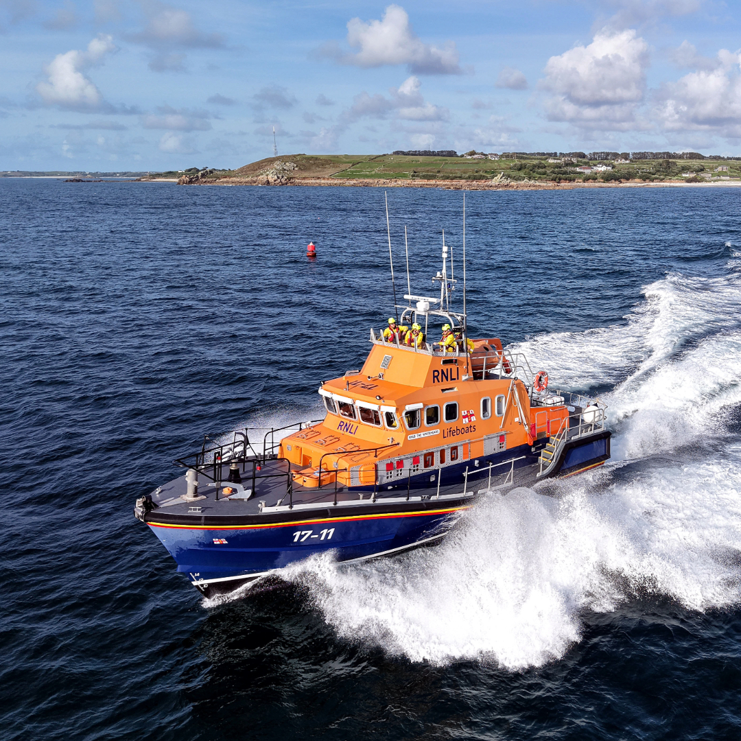 Aerial drone shot of St Marys Severn class all-weather lifeboat The Whiteheads 17-11 at sea.