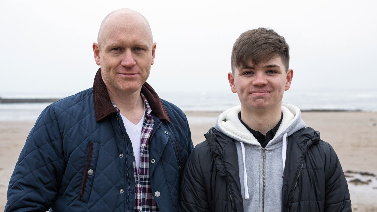 Evan Chrisp, who survived after following RNLI advice, and his father Simon