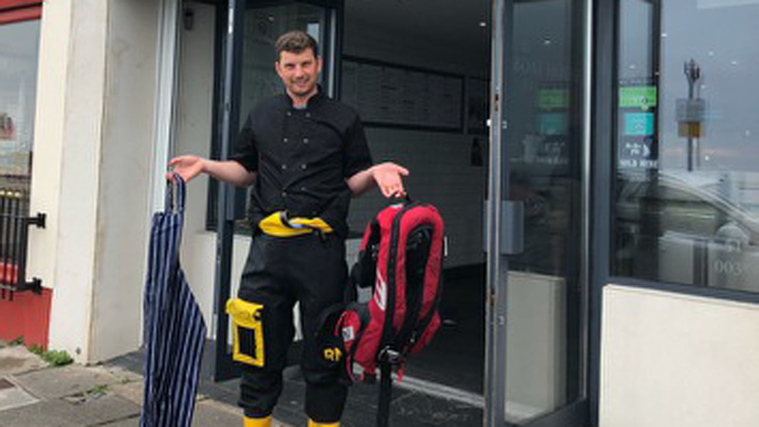 Porthcawl Crew Member outside the BoatHouse Fish Bar
