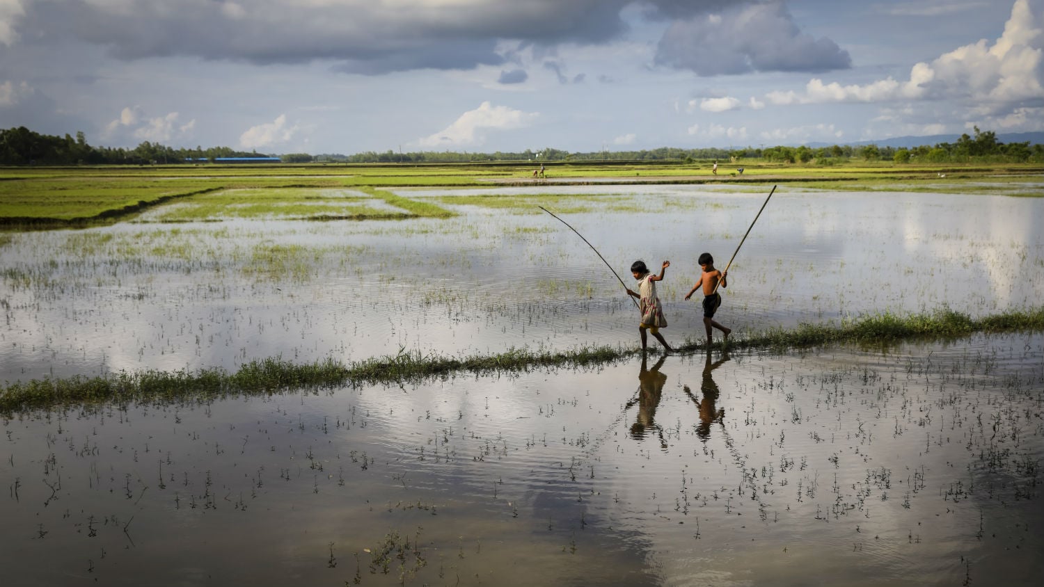A brother and sister fish in Cox’s Bazar, Bangladesh