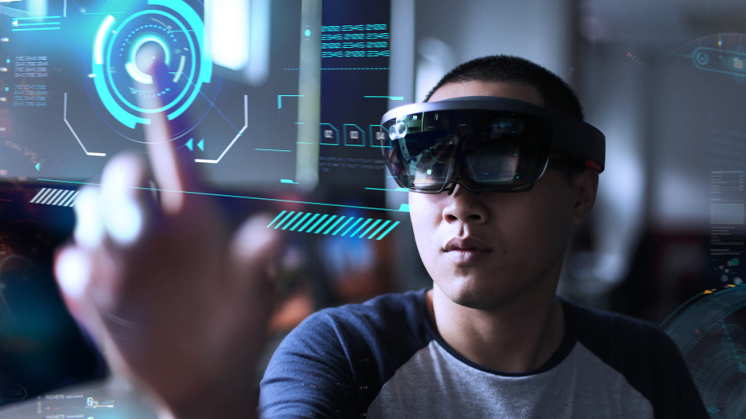 A man using Microsoft's Holo Lens augmented reality headset