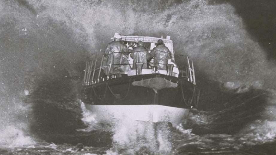 Margate RNLI launching the lifeboat down the slipway in a storm in 1952