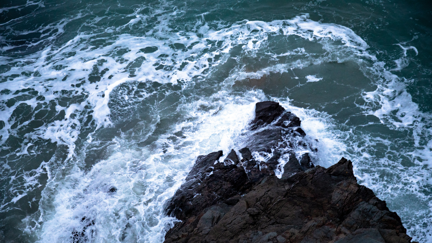 The view from the cliffs at Tolcarne Beach