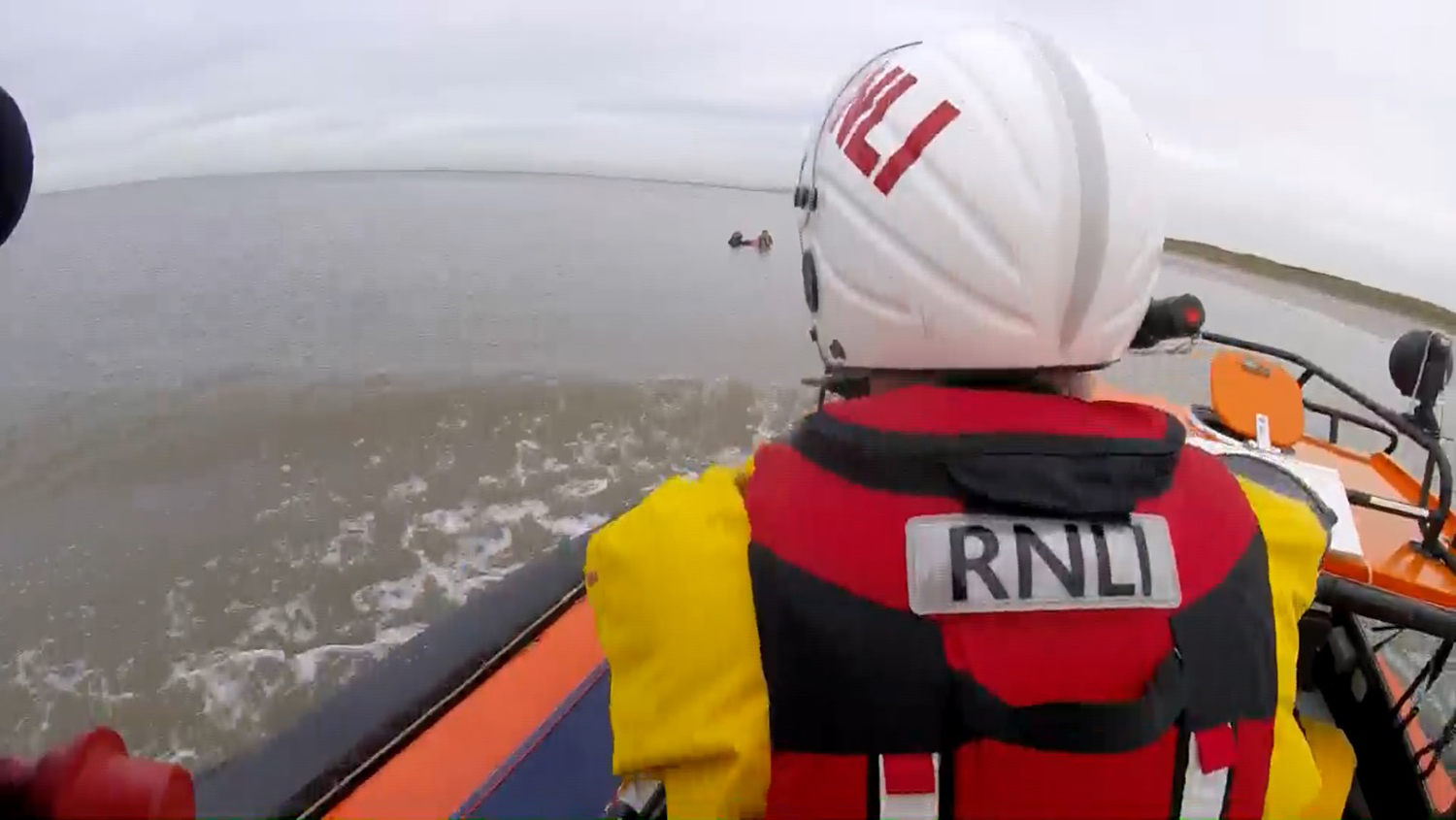 RNLI Hoylake launch to the rescue of dog walkers stuck in mud