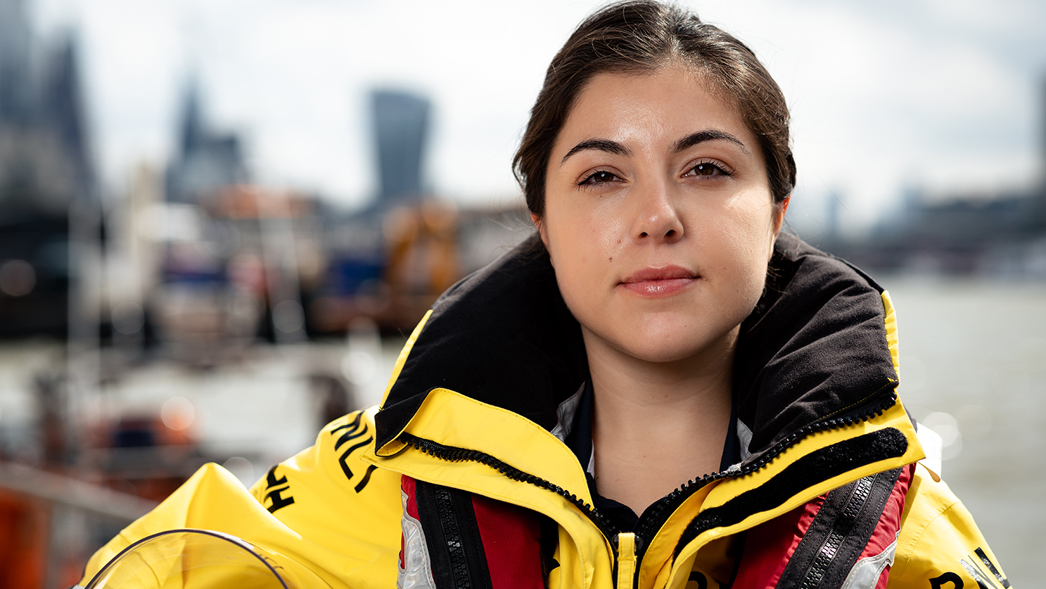 Holly McGinchey, standing by Tower Lifeboat Station, in full all-weather lifeboat kit