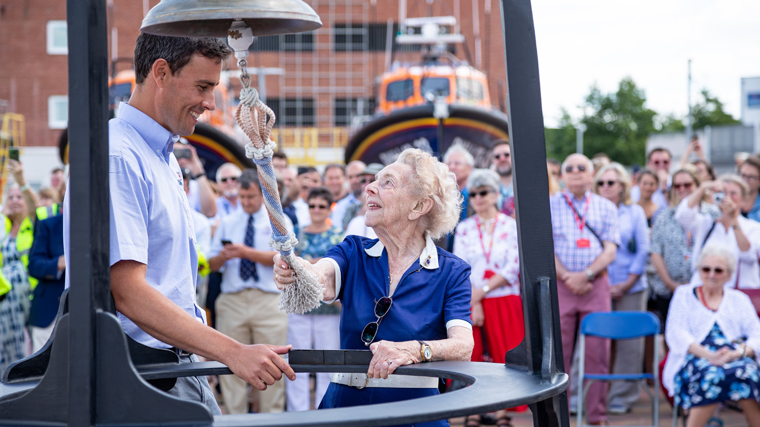 RNLI fundraiser Joan Webb at a bell-ringing ceremony in Poole