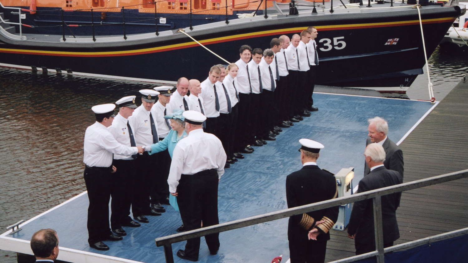The Queen greets sailors at a naming ceremony