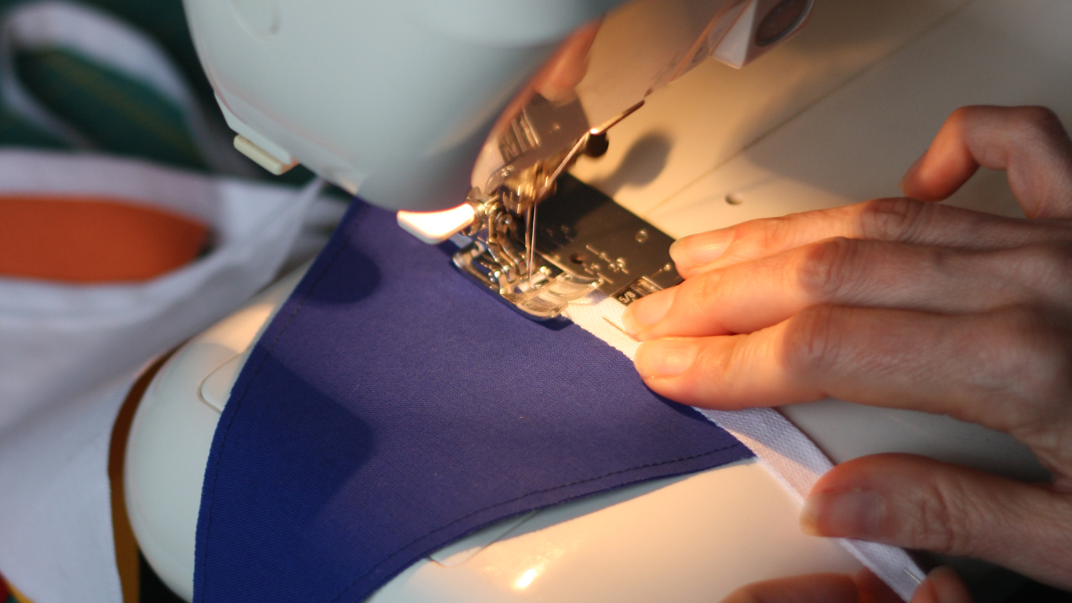 To avoid fraying, fold each end of the tape over about