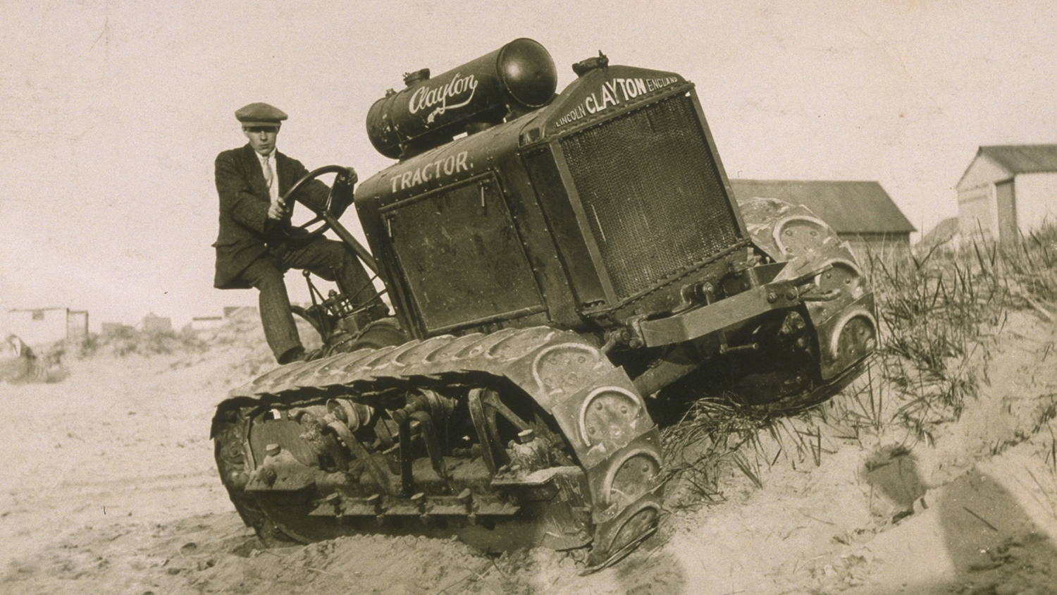A volunteer atop a Clayton and Shuttleworth tractor